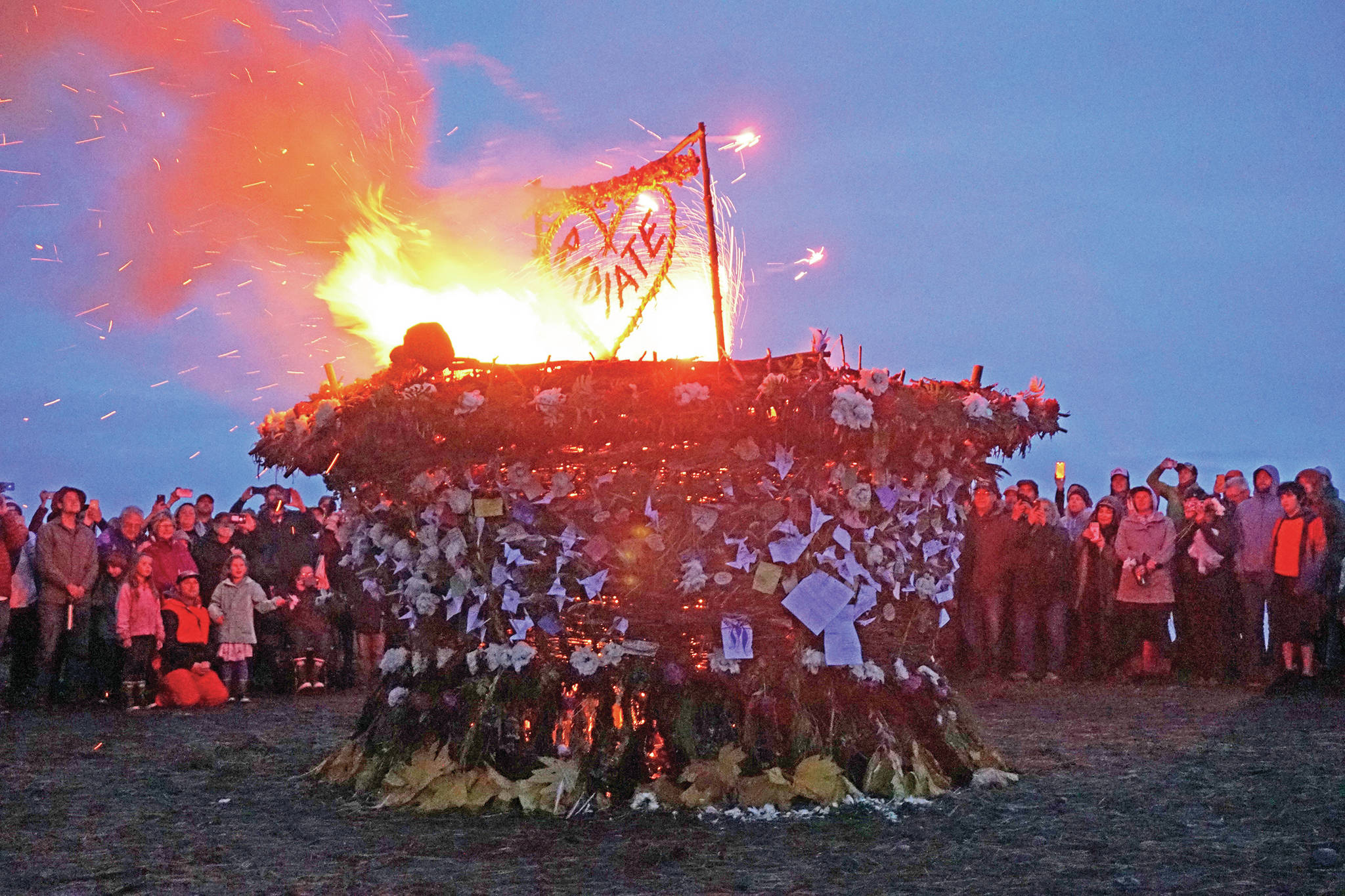 “Radiate,” the 16th annual Burning Basket, catches fire Sunday night, Sept. 15, 2019, at Mariner Park on the Homer Spit in Homer, Alaska. (Photo by Michael Armstrong/Homer News)