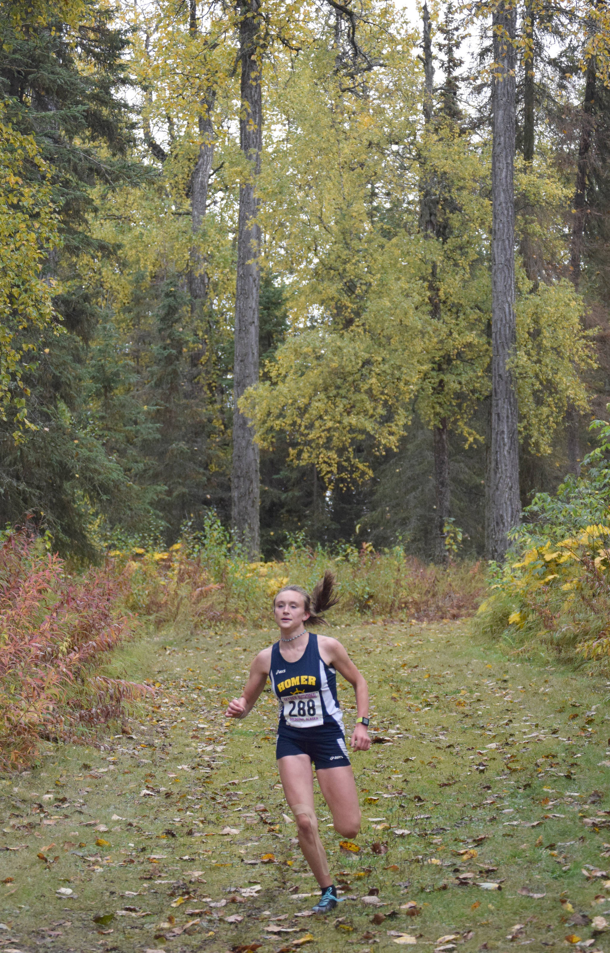 Homer’s Autumn Daigle runs to victory in the girls varsity race Saturday, Sept. 21, 2019, at Tsalteshi Trails in Soldotna, Alaska. (Photo by Jeff Helminiak/Peninsula Clarion)