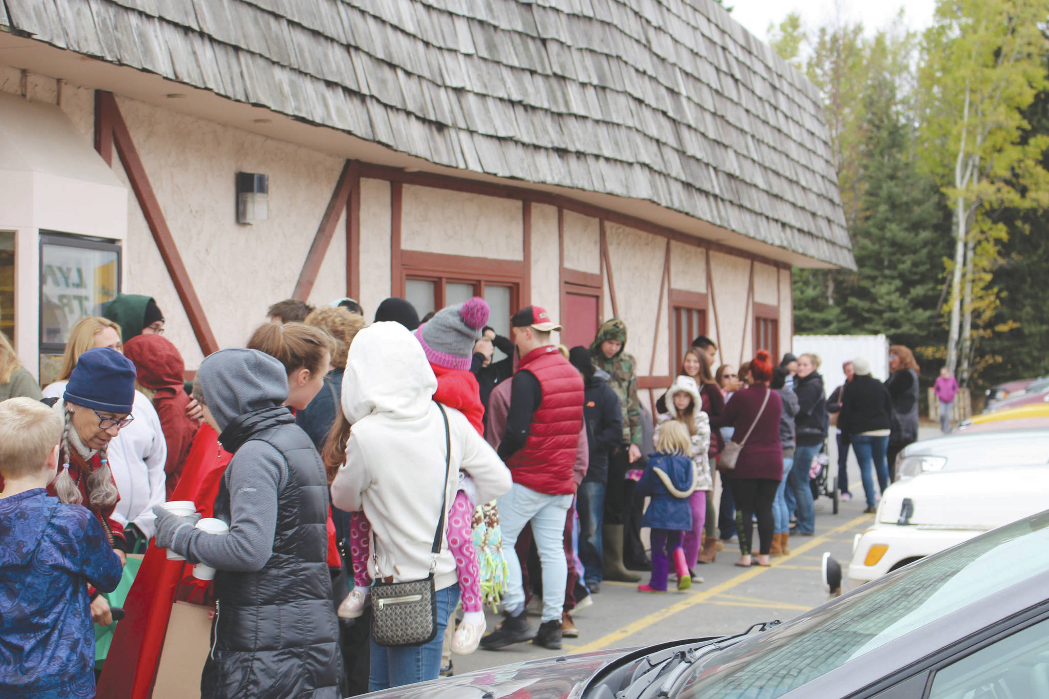 Photo by Brian Mazurek/Peninsula Clarion                                 The line outside of the Moose is Loose Bakery can be seen here on their last day of business in Soldotna, Alaska on Sept. 28, 2019.