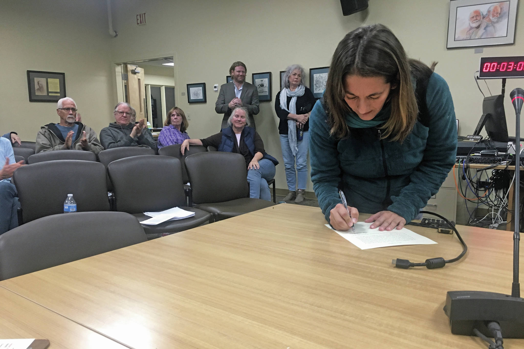Storm Hansen-Cavasos is sworn in as a new member of the Homer City Council at a Monday, Oct. 14, 2019 council meeting at Homer City Hall in Homer, Alaska. Hansen-Cavasos’ residency prior to the election has been called into question and the council called for an official investigation. (Photo by Megan Pacer/Homer News)