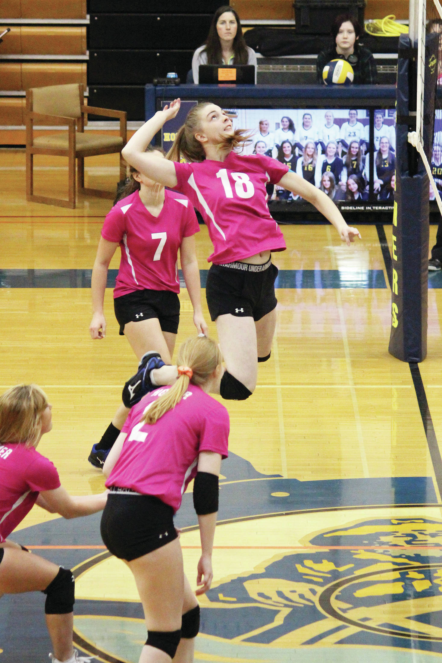 Homer’s Karmyn Gallios jumps to spike the ball during a Friday, Oct. 18, 2019 volleyball game against Seward High School in the Alice Witte Gymnasium in Homer, Alaska. (Photo by Megan Pacer/Homer News)
