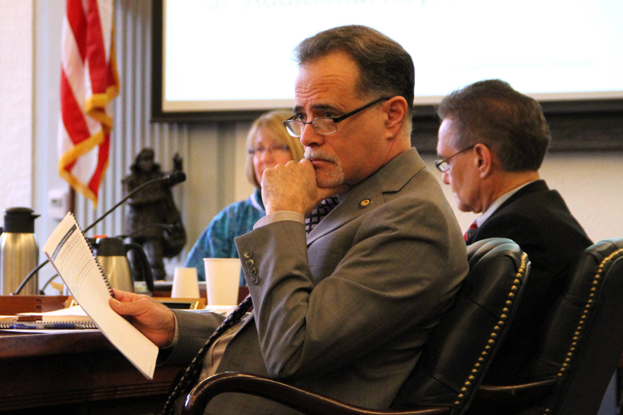 courtesy photo                                State Sen. Peter Micciche (R-Soldotna) listens to testimony in Juneau in this undated photo.