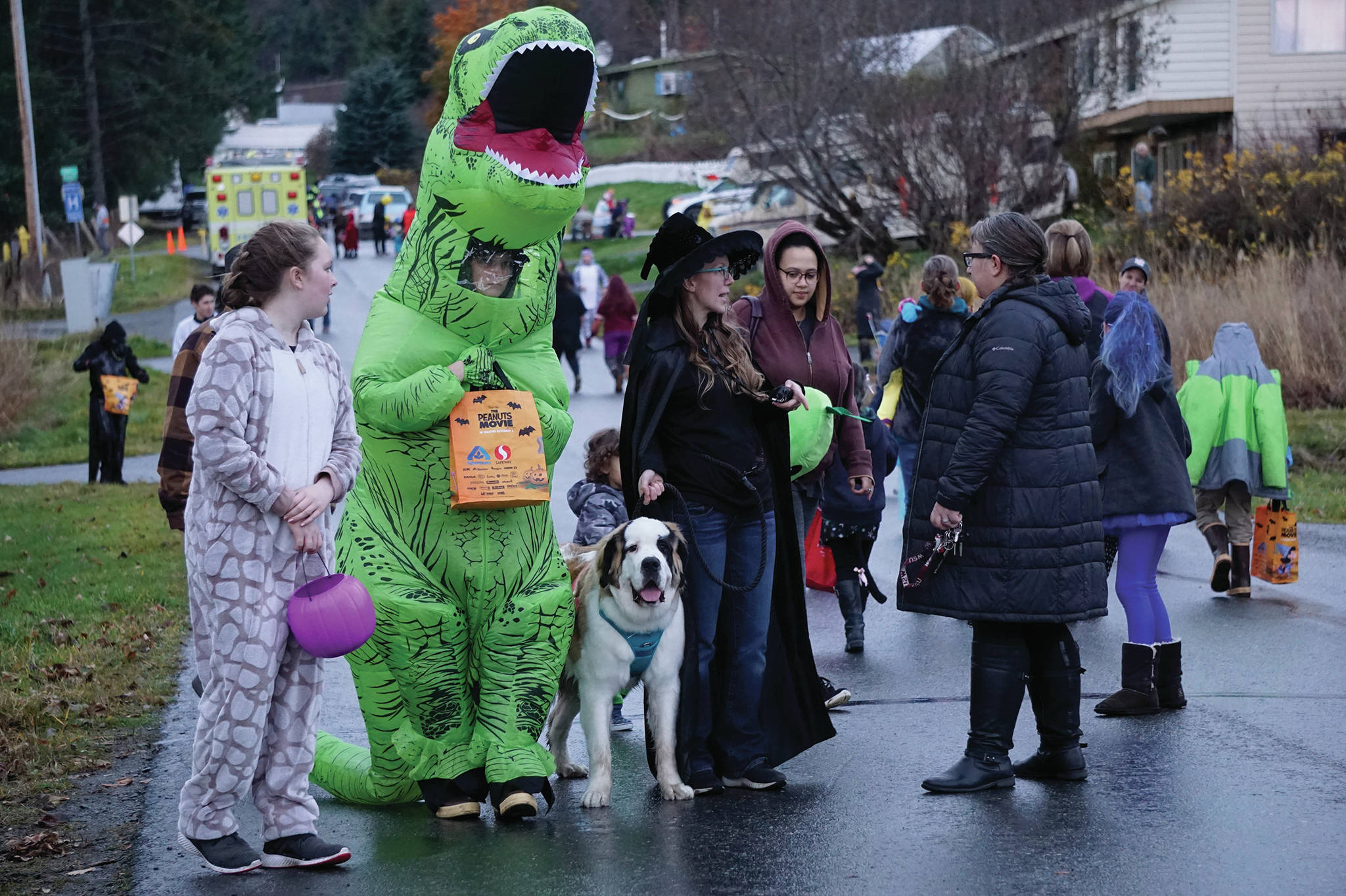Halloween trick-or-treaters walk down Bayview Avenue, on Oct. 31, 2019, in Homer, Alaska. Bayview Avenue and Mountainview Avenue were one-way for the night to minimize traffic. (Photo by Michael Armstrong/Homer News)