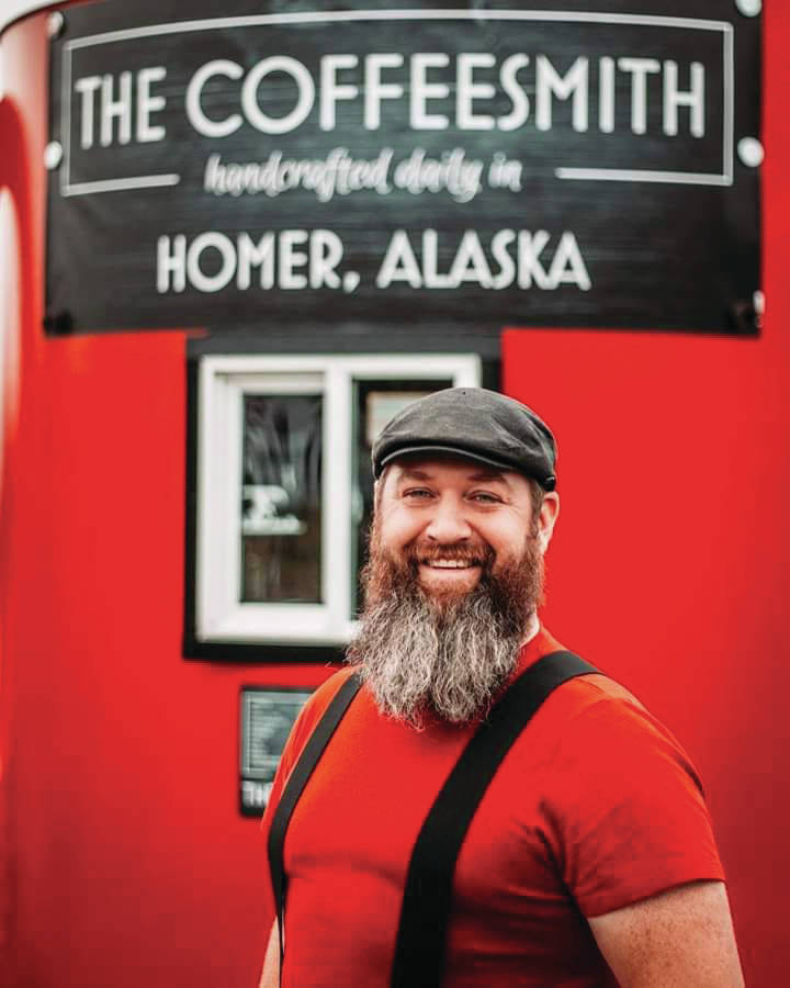 Ethan Smith, shown here in this undated photo in front of his coffee business, The Coffeesmith, at the intersection of Main Street and the Sterling Highway in Homer, Alaska. (Photo by J Coe Photography)