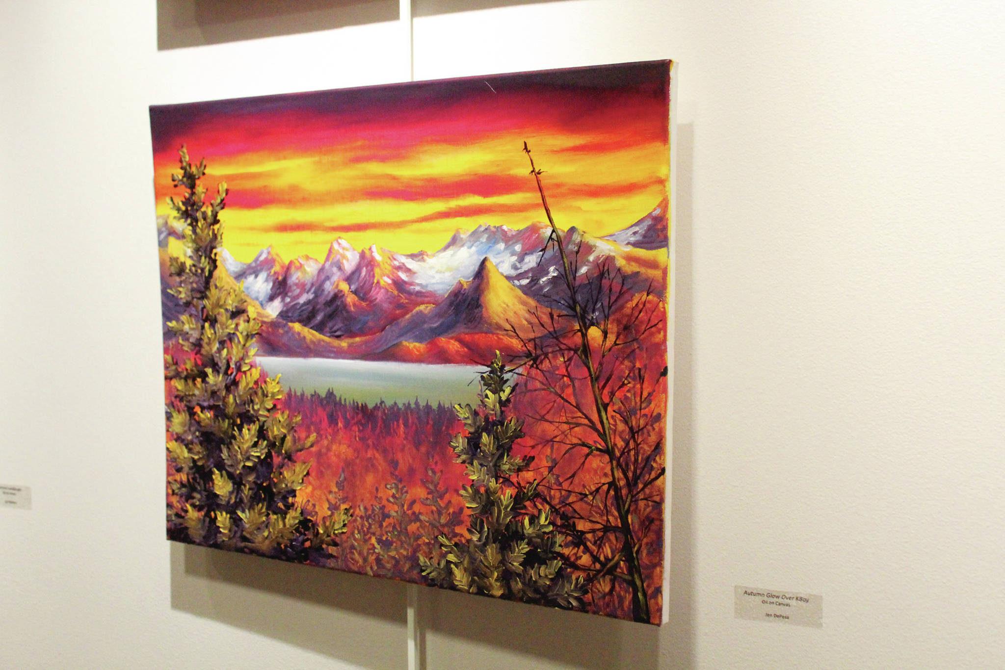 An oil painting by Jen DePesa hangs on the wall during a First Friday art exhibit opening Friday, Nov. 1, 2019 at Kachemak Bay Campus in Homer, Alaska. The exhibit features art by students in a class taught at the college by Asia Freeman. (Photo by Megan Pacer/Homer News)