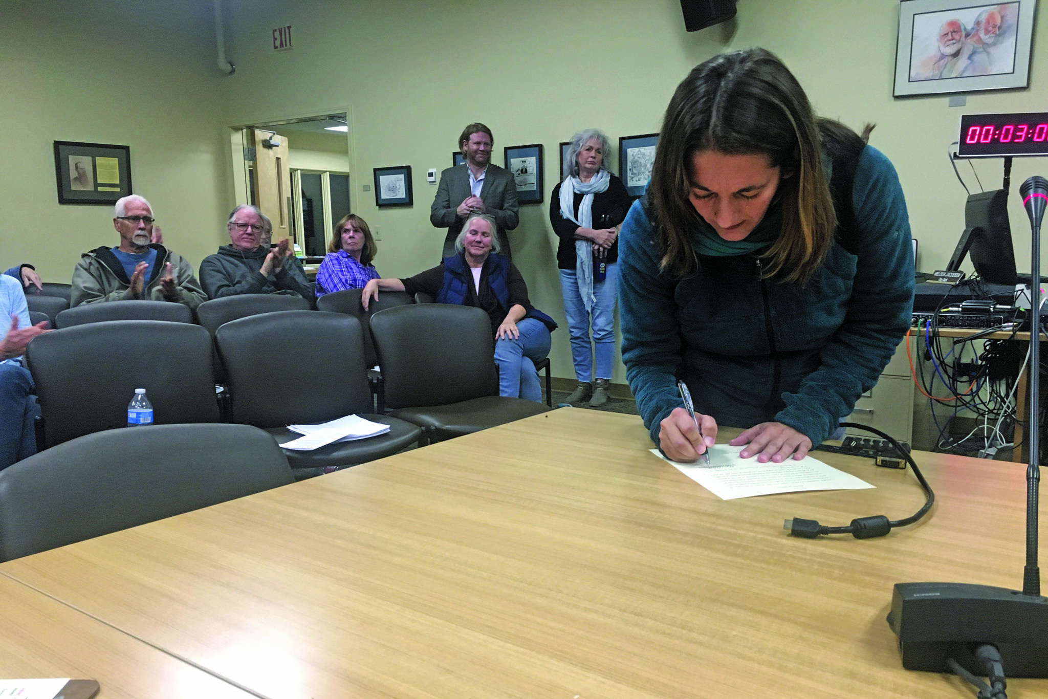 Storm Hansen-Cavasos is sworn in as a new member of the Homer City Council at a Monday, Oct. 14, 2019 council meeting at Homer City Hall in Homer, Alaska. (Photo by Megan Pacer/Homer News)