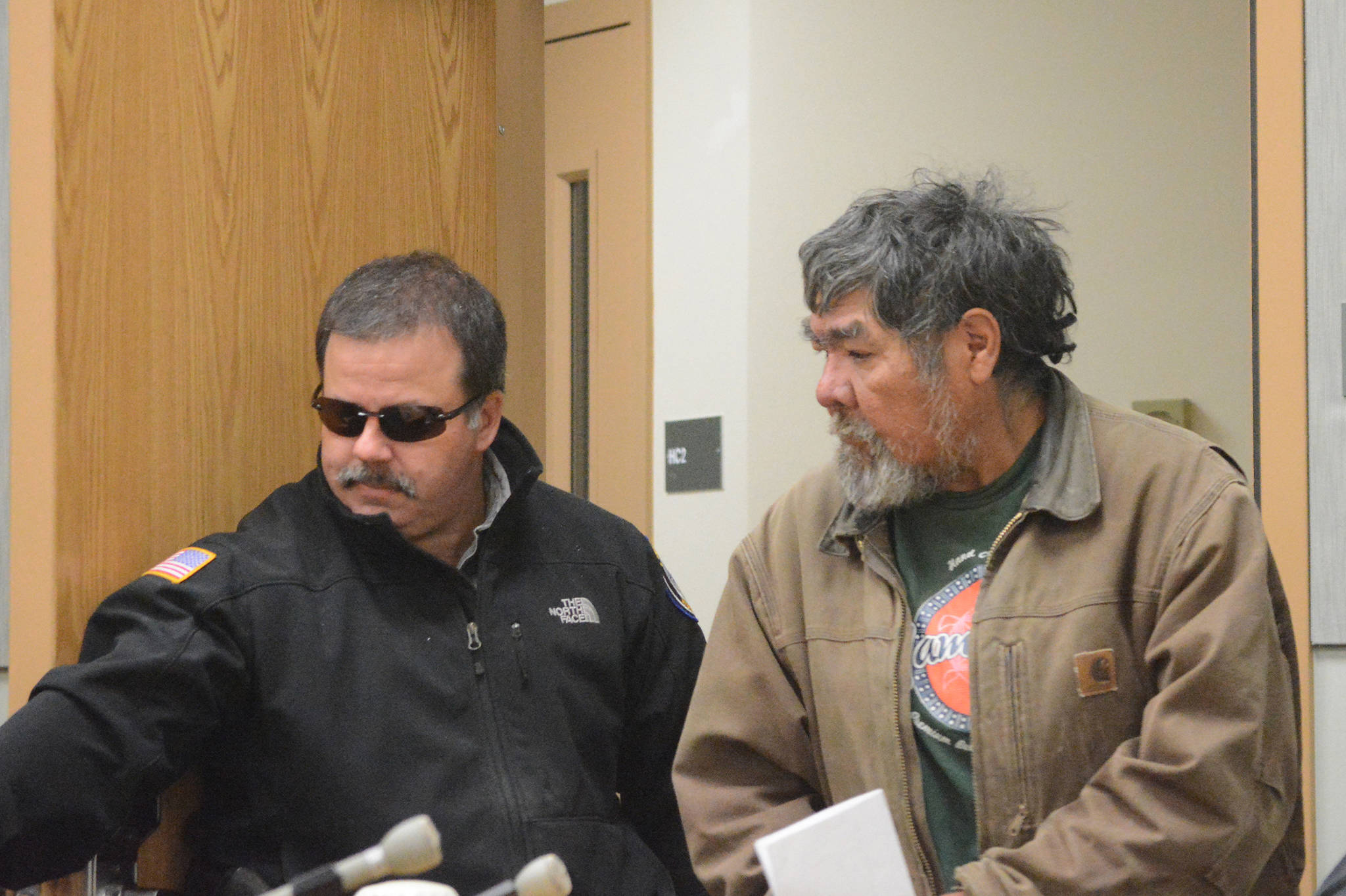Homer Police Community Jail Officer Rick Pitta brings Lee John Henry into the Homer Courtroom for his arraignment on Monday, Oct. 17, 2016, in Homer, Alaska. Henry was charged with first-degree murder in the July 2013 death of Mark Matthew in Homer. (Photo by Michael Armstrong/Homer News)