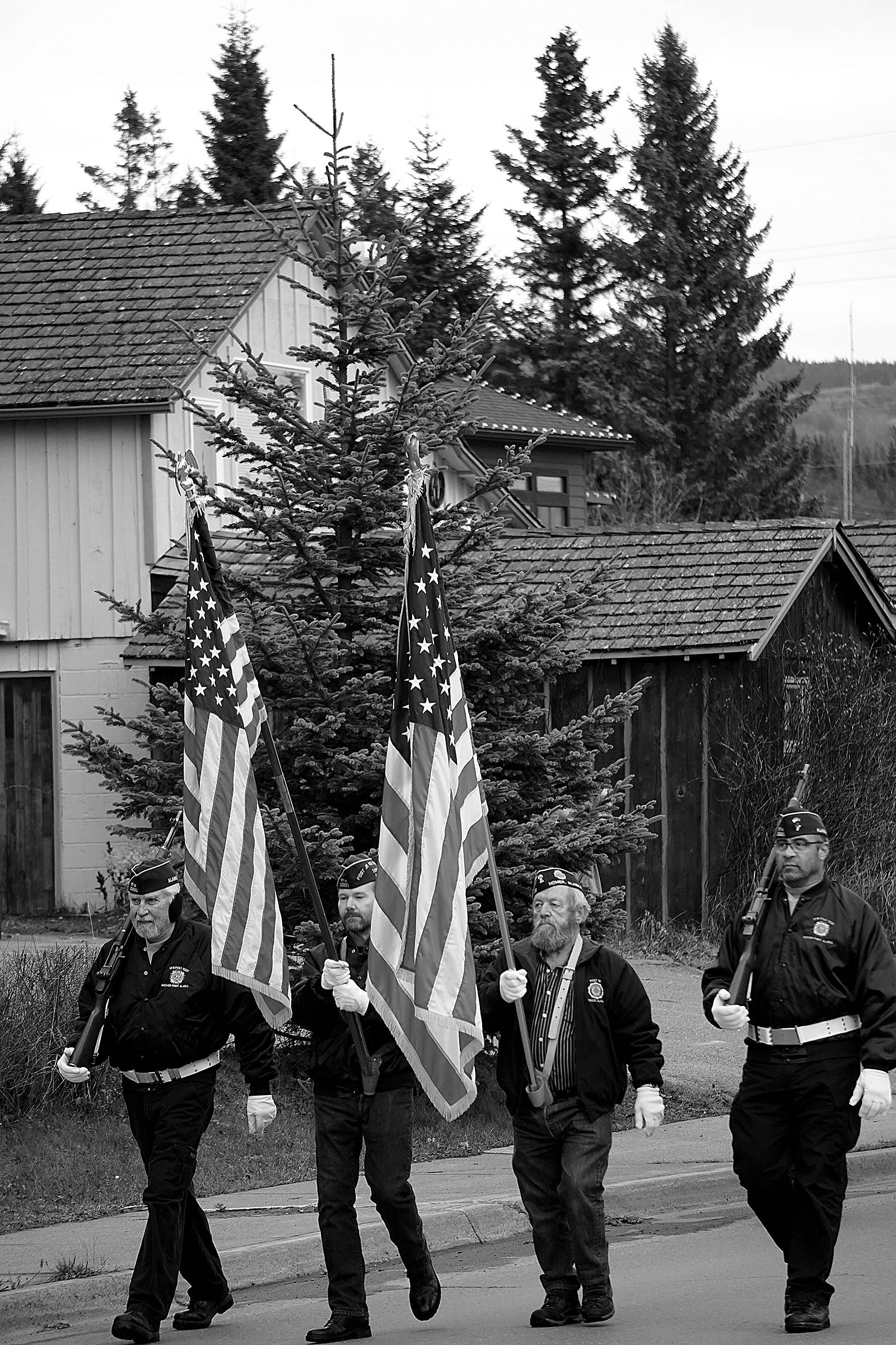 Photo by Michael Armstrong / Homer News                                 Members of the Veterans of Foreign Wars, Anchor Point Post, march on Pioneer Avenue in Veterans Day ceremonies on Nov. 11, 2019,in Homer, Alaska.