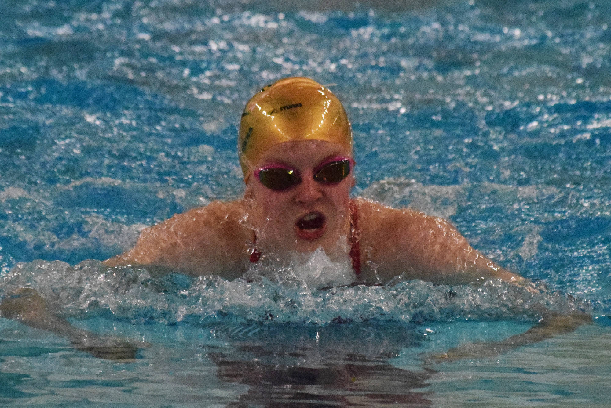 Seward’s Lydia Jacoby races to the win in the girls 100-yard breaststroke final Saturday, Nov. 9, 2019, at the ASAA state swimming and diving championship at the Bartlett pool in Anchorage, Alaska. (Photo by Joey Klecka/Peninsula Clarion)