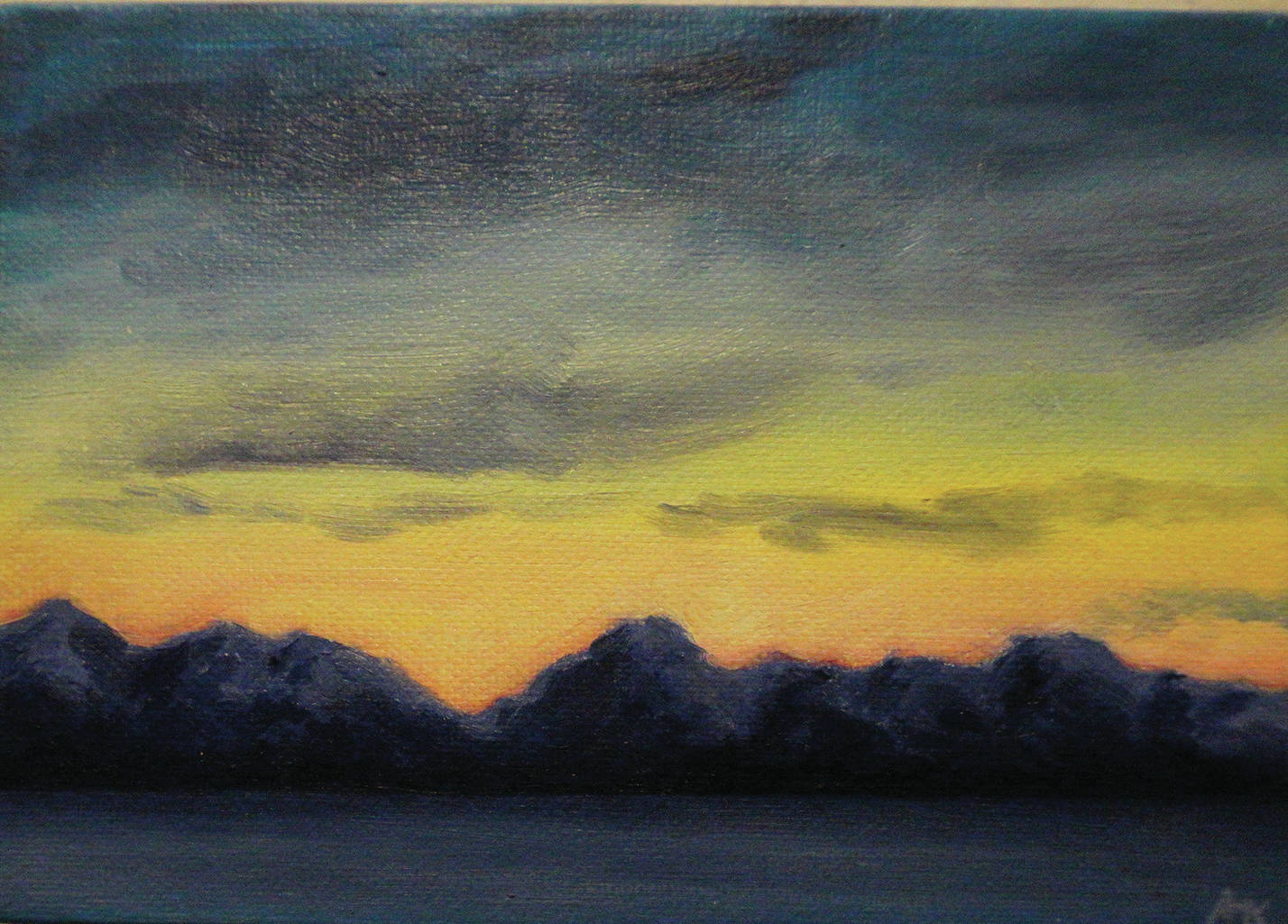 Amanda Kelly’s “Kachemak Bay Sunset” is one of the pieces in the 5x7 show at the Homer Council on the Arts that opened on Nov. 1, 2019, in Homer, Alaska. (Photo by Michael Armstrong/Homer News)