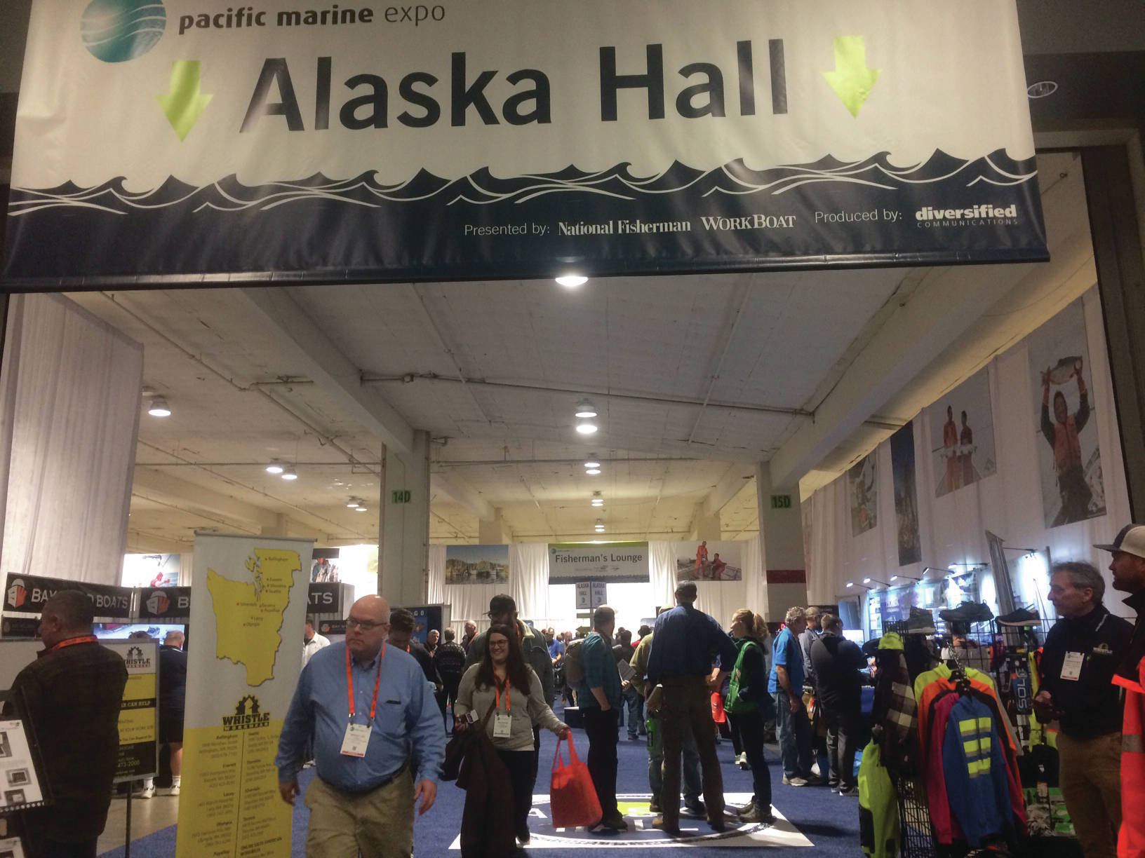 Pacific Marine Expo’s “Alaska Hall” was aptly named for the number of booths representing Alaska state agencies, boroughs, cities, businesses and issues of state-wide importance. The hall was home to the city of Homer and Homer Marine Trades Association booth during the Nov. 21-23, 2019, event in Seattle. (Photo by McKibben Jackinsky)