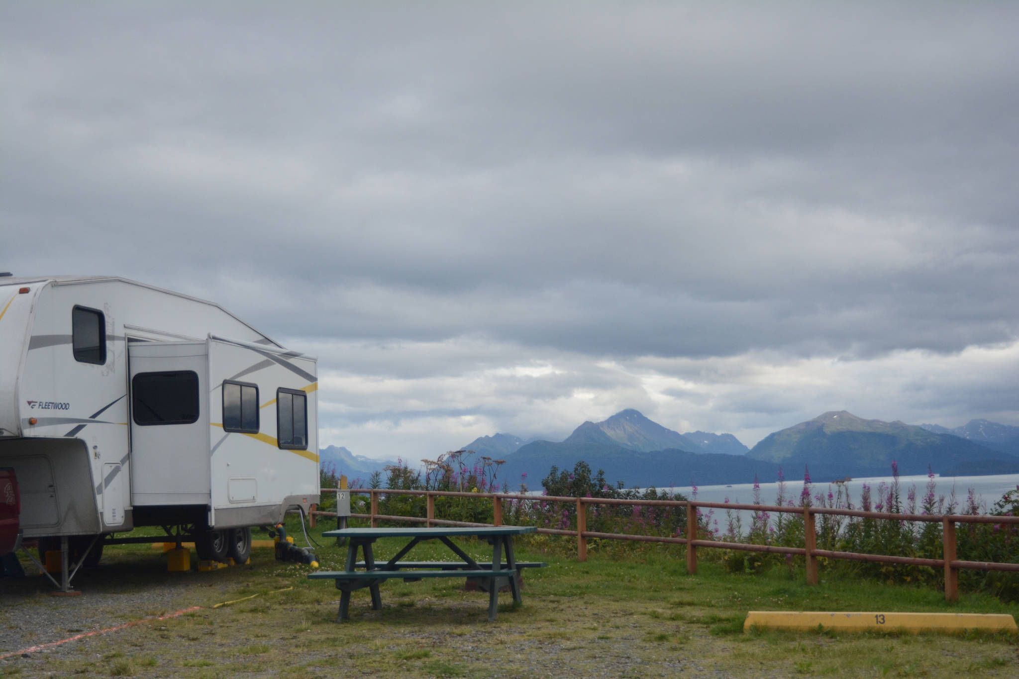 A campsite at Baycrest RV Park looks out over Kachemak Bay near Baycrest Hill in Homer, Alaska, on Aug, 18, 2018 at The Homer/Baycrest KOA Campground near Baycrest Hill in Homer, Alaska. Formerly the Baycrest RV Park, owners Shelly and Jeff Erickson made it a KOA campground in the fall of 2017. (Photo by Michael Armstrong/Homer News).