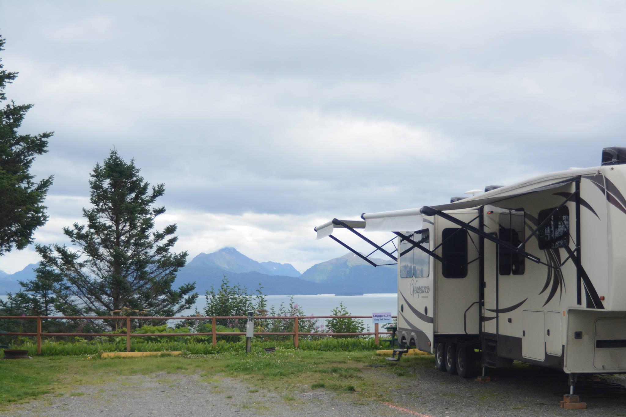 A campsite at Baycrest RV Park looks out over Kachemak Bay near Baycrest Hill in Homer, Alaska, on Aug. 18, 2018 at The Homer/Baycrest KOA Campground near Baycrest Hill in Homer, Alaska. Formerly the Baycrest RV Park, owners Shelly and Jeff Erickson made it a KOA campground in the fall of 2017. (Photo by Michael Armstrong/Homer News).