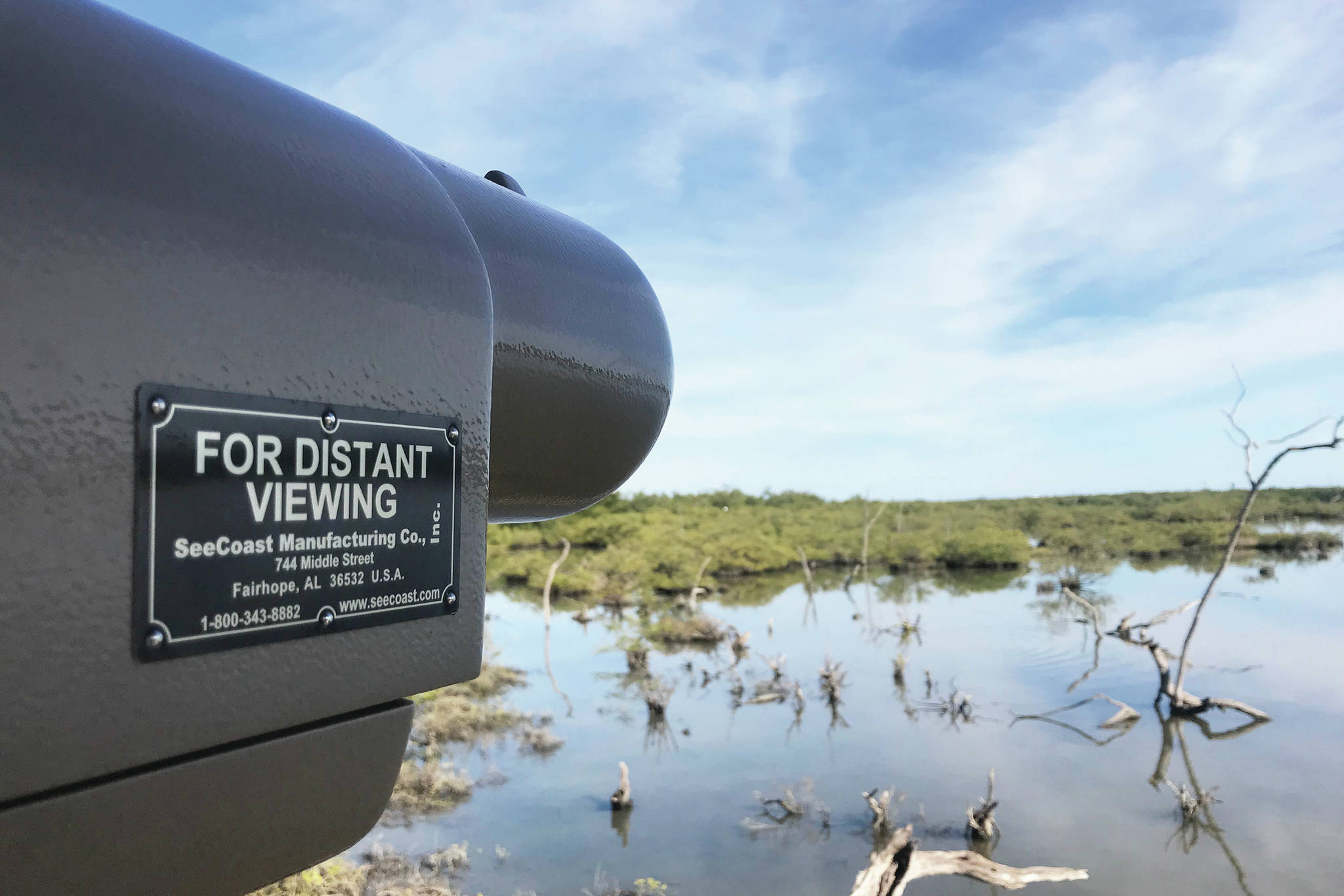 A scope looks out at a wetland at Pelican Island Wildlife Refuge on Nov. 27 near Vero Beach, Florida. (Photo by Kat Sorensen)