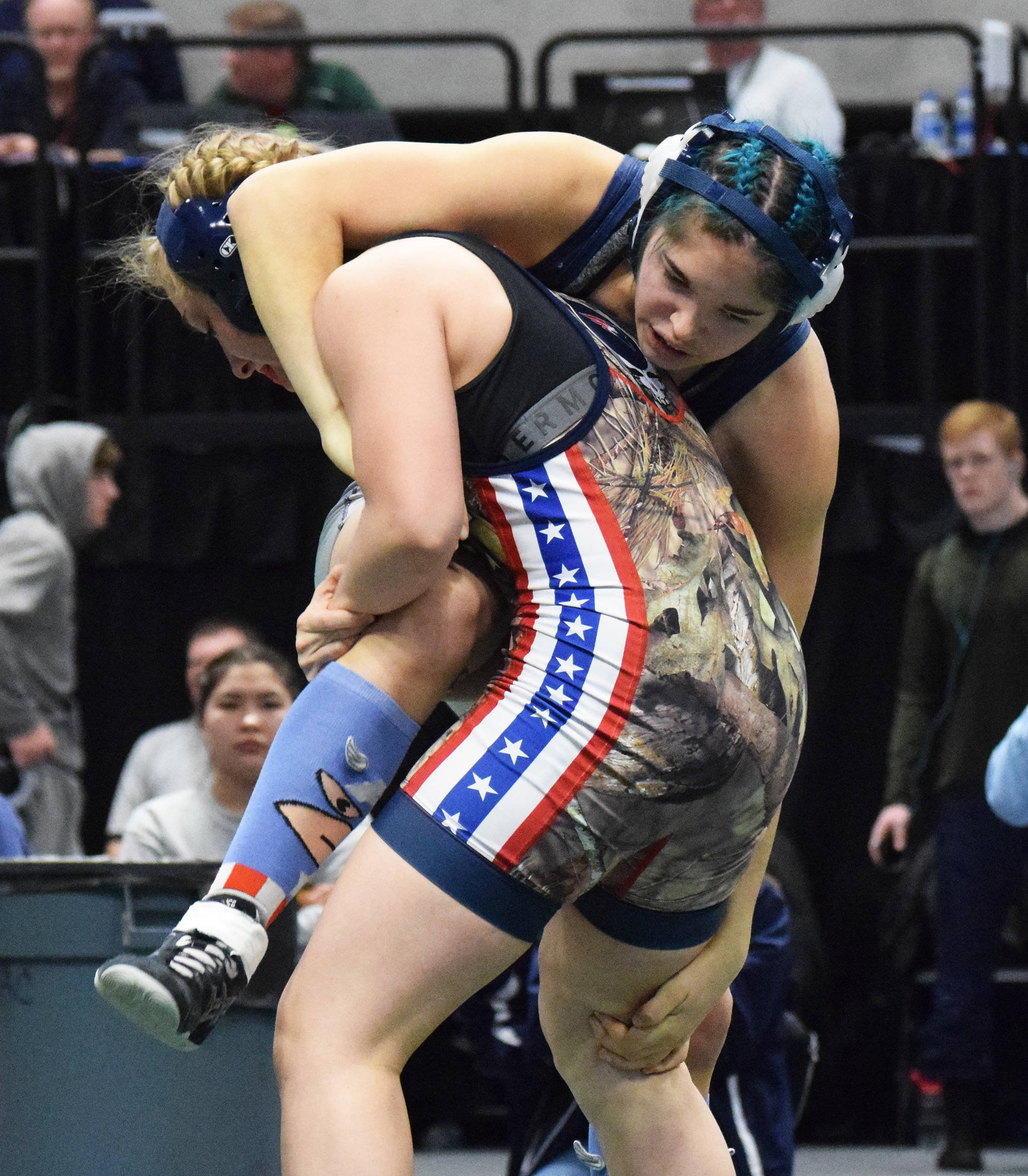 Soldotna’s Trinity Donovan wrestles Emily Bellant of North Pole in the girls 145-pound final Saturday, Dec. 21, 2019, at the ASAA State Wrestling Championships at the Alaska Airlines Center in Anchorage, Alaska. (Photo by Joey Klecka/Peninsula Clarion)
