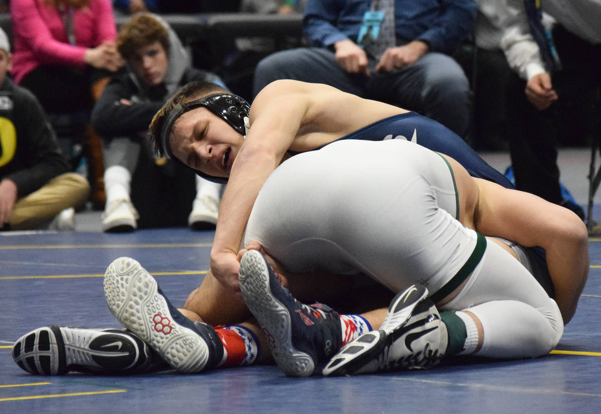 Soldotna’s Dennis Taylor battles Colony’s Vincent Cramer in the Division I boys 152-pound final Saturday, Dec. 21, 2019, at the ASAA State Wrestling Championships at the Alaska Airlines Center in Anchorage, Alaska. (Photo by Joey Klecka/Peninsula Clarion)