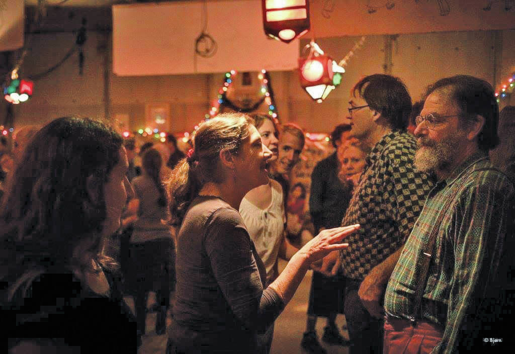 Dancers take a break at the 2018 Contra dance held New Year’s Eve in the South Peninsula Athletic and Recreational Complex in Homer, Alaska. (Photo provided)