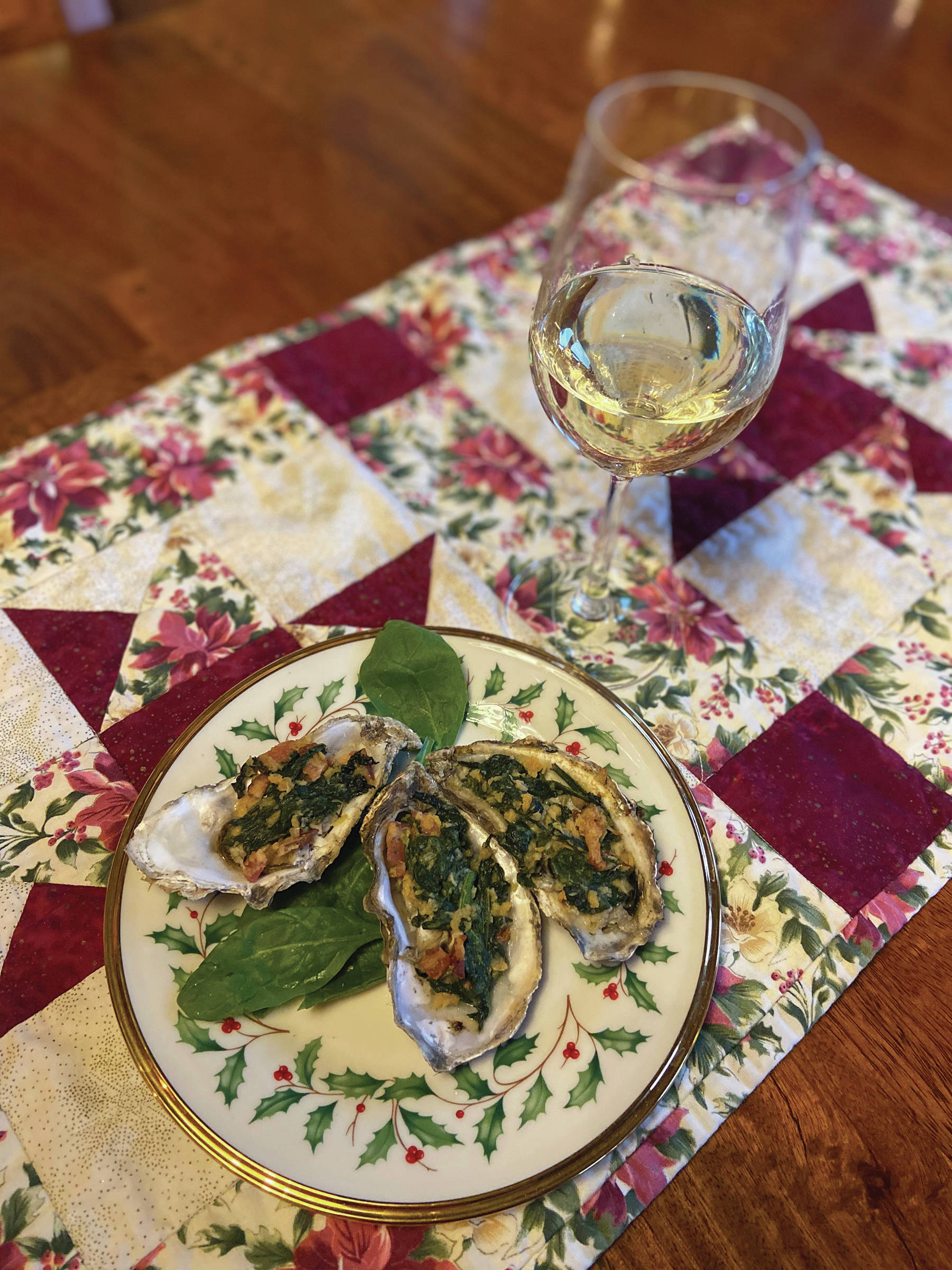A glass of bubbly and Oysters Rockefeller make the perfect way to toast in the New Year, as seen here in Teri Robl’s kitchen on Dec. 22, 2019, in Homer, Alaska. (Photo by Teri Robl).
