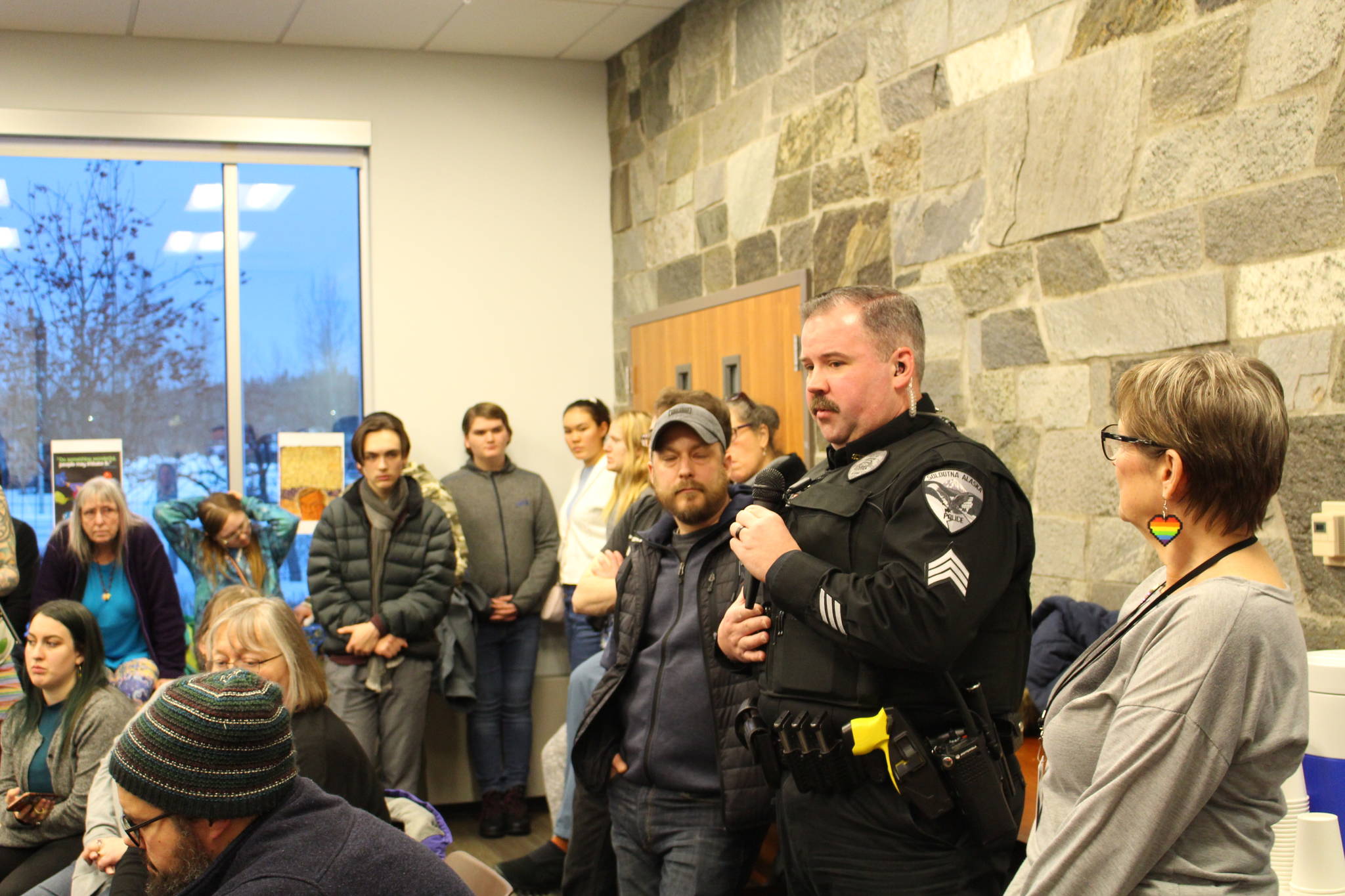 Sgt. Tobin Brennan with the Soldotna Police Department speaks at the LGBTQ Town Hall at the Soldotna Public Library in Soldotna, Alaska on Jan. 4, 2020. (Photo by Brian Mazurek/Peninsula Clarion)