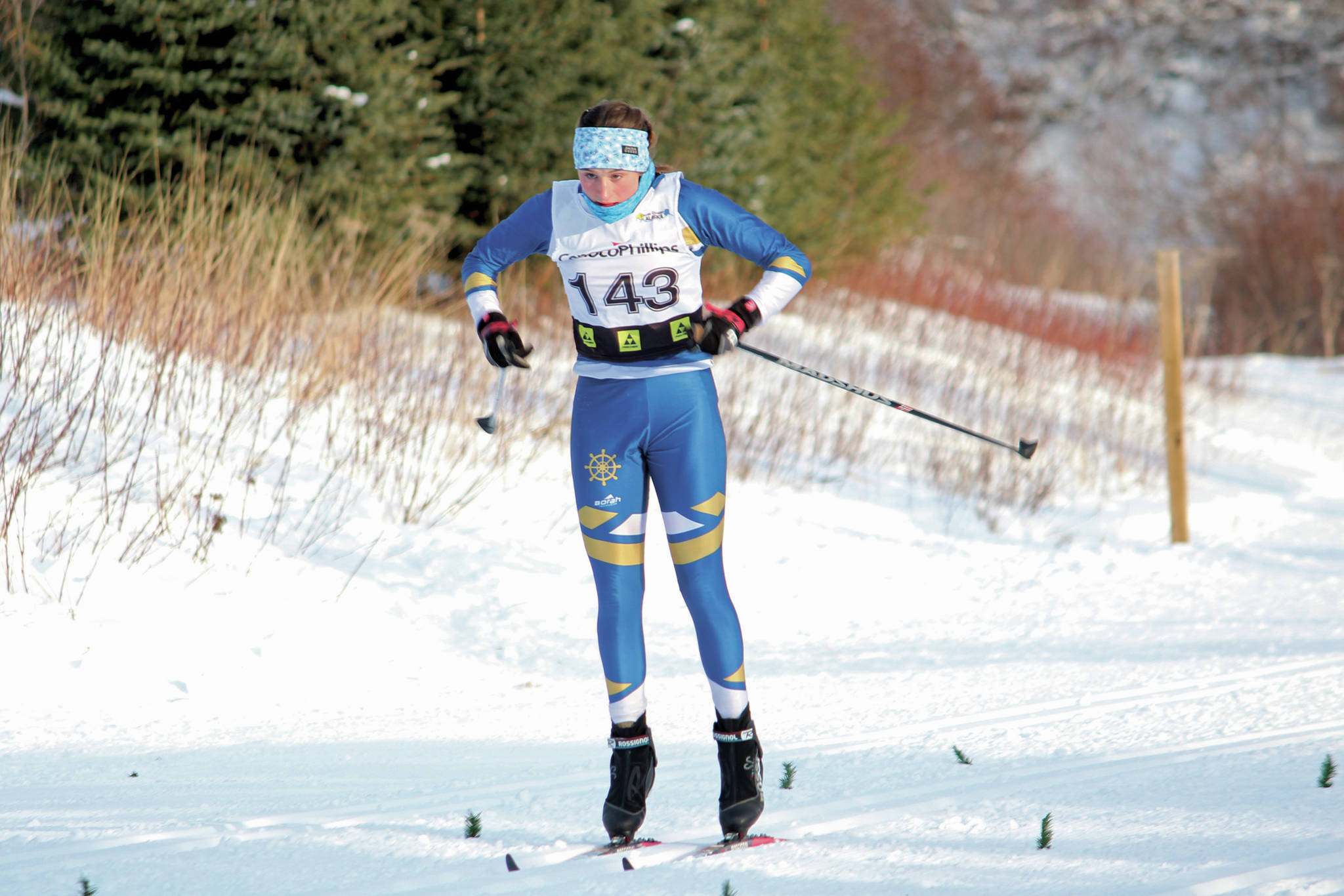 Homer’s Autumn Daigle skis to the finish of the Besh Cup 4 race, a 10-kilometer interval start classic race, on Sunday, Jan. 19, 2020 at the Lookout Mountain Trails on Ohlson Mountain Road outside Homer, Alaska. (Photo by Megan Pacer/Homer News)