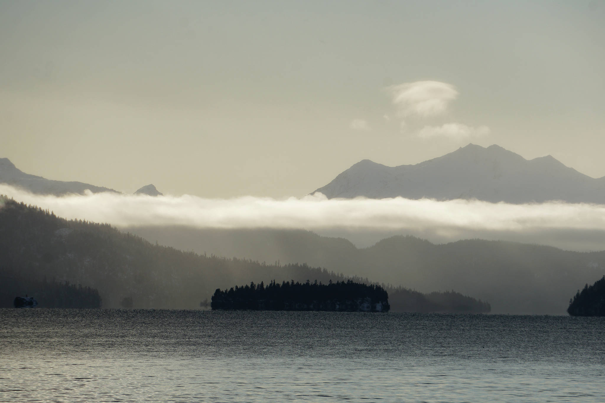 Light snow falls over Eldred Passage on the south side of Kachemak Bay on Monday afternoon, Jan. 20, 2020, near Homer, Alaska. (Photo by Michael Armtrong/Homer News)