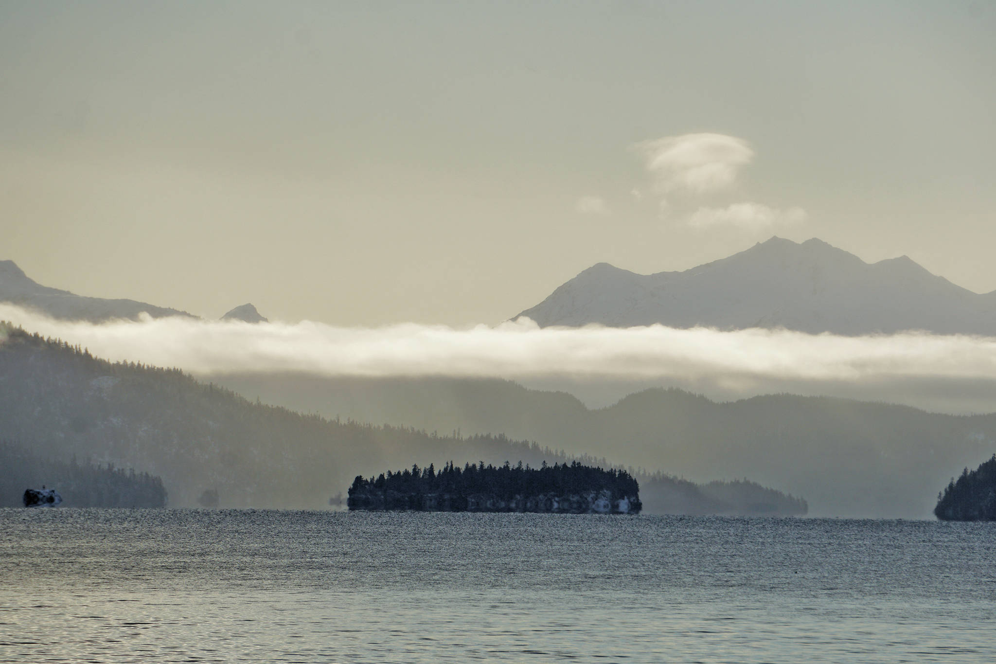 Light snow falls over Eldred Passage on the south side of Kachemak Bay on Monday afternoon, Jan. 20, 2020, near Homer, Alaska. (Photo by Michael Armtrong/Homer News)