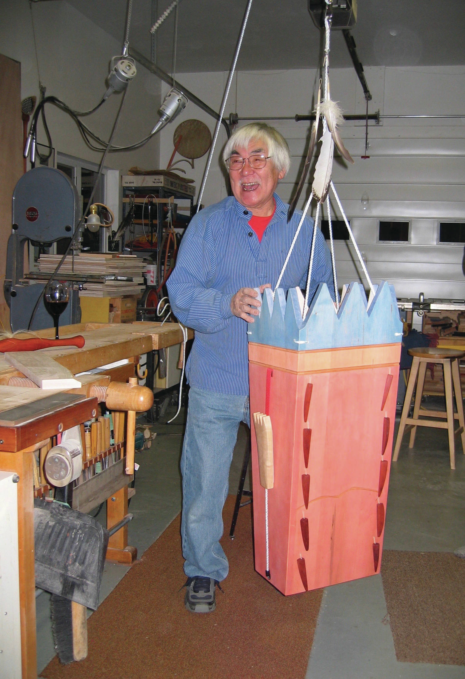Ron Senungetuk poses with a drum he made on Jan. 14, 2005, in Homer, Alaska. (Photo courtesy of Rika Mouw)