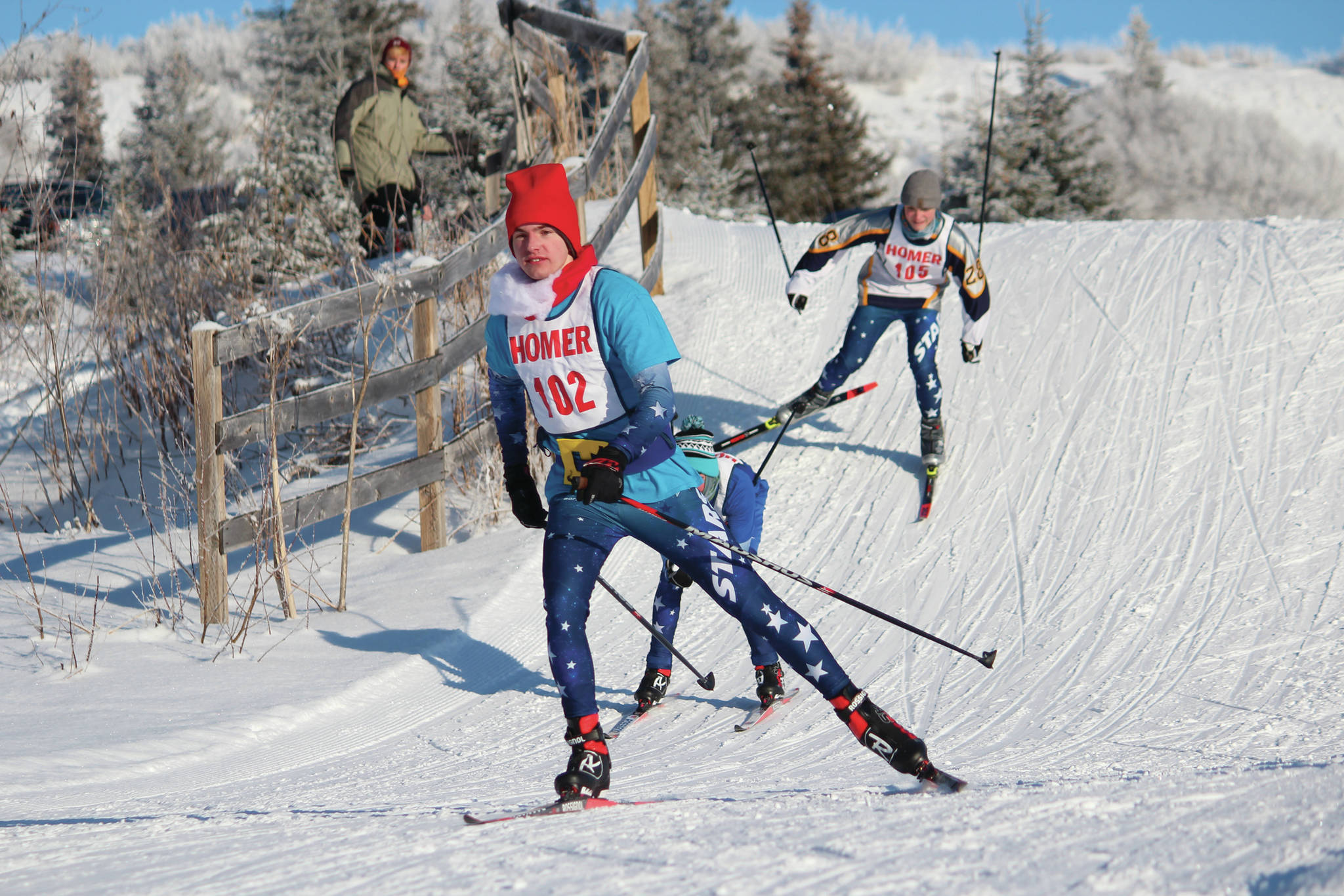 Soldotna’s Jack Harris leads a group of skiers down a hill during the boys’ varsity 5-kilometer skate race Saturday, Feb. 1, 2020 during the Homer Invite at the Lookout Mountain Trails on Ohlson Mountain Road near Homer, Alaska. (Photo by Megan Pacer/Homer News)