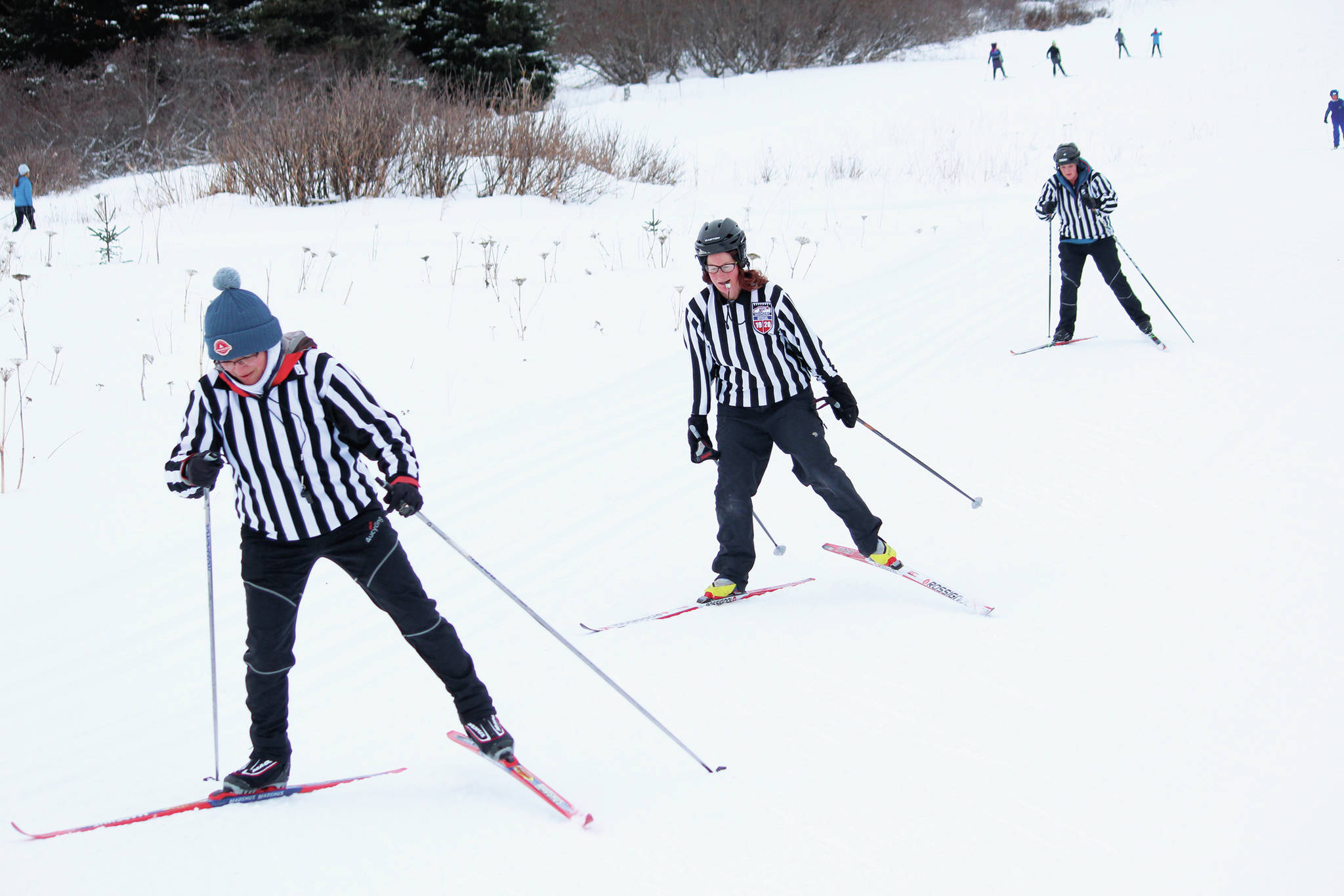 Three skiers dressed as referees ski up a hill during this year’s Ski for Women on Sunday, Feb. 2, 2020 at the Lookout Trails on Ohlson Mountain Road near Homer, Alaska. (Photo by Megan Pacer/Homer News)