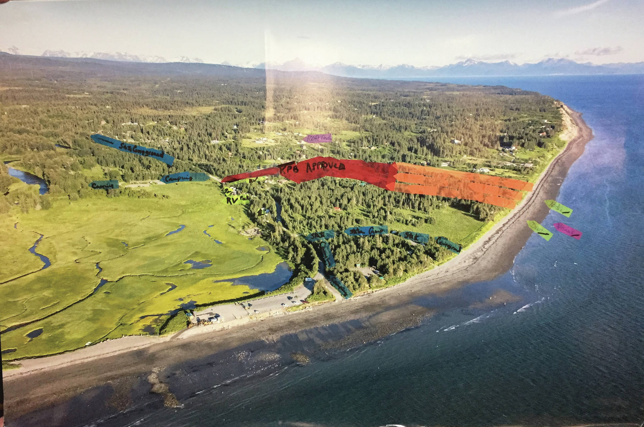 A diagram presented by Teresa Jacobson Gregory illustrates the proposed extension of the Trimbles’ gravel pit and the impact it may have on the surrounding state recreation area. The red markers indicate the current gravel mining area, and the orange represents the area the extension may allow for mining if approved. Kenai Peninsula Borough Planning Department liaison Bruce Wall said there would be a 100-feet setback from the ocean. (Image courtesy Teresa Jacobson Gregory)