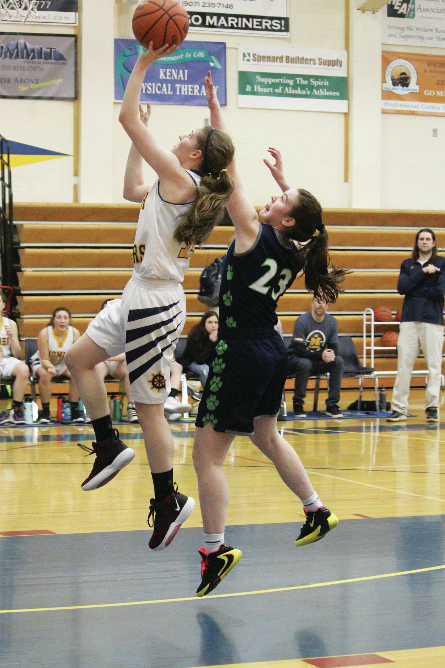Redington’s Lexi Seymore follows Homer’s Laura Inama as she goes up for a basket during a Friday, Feb. 21, 2020 basketball game in the Alice Witte Gymnasium in Homer, Alaska. (Photo by Megan Pacer/Homer News)