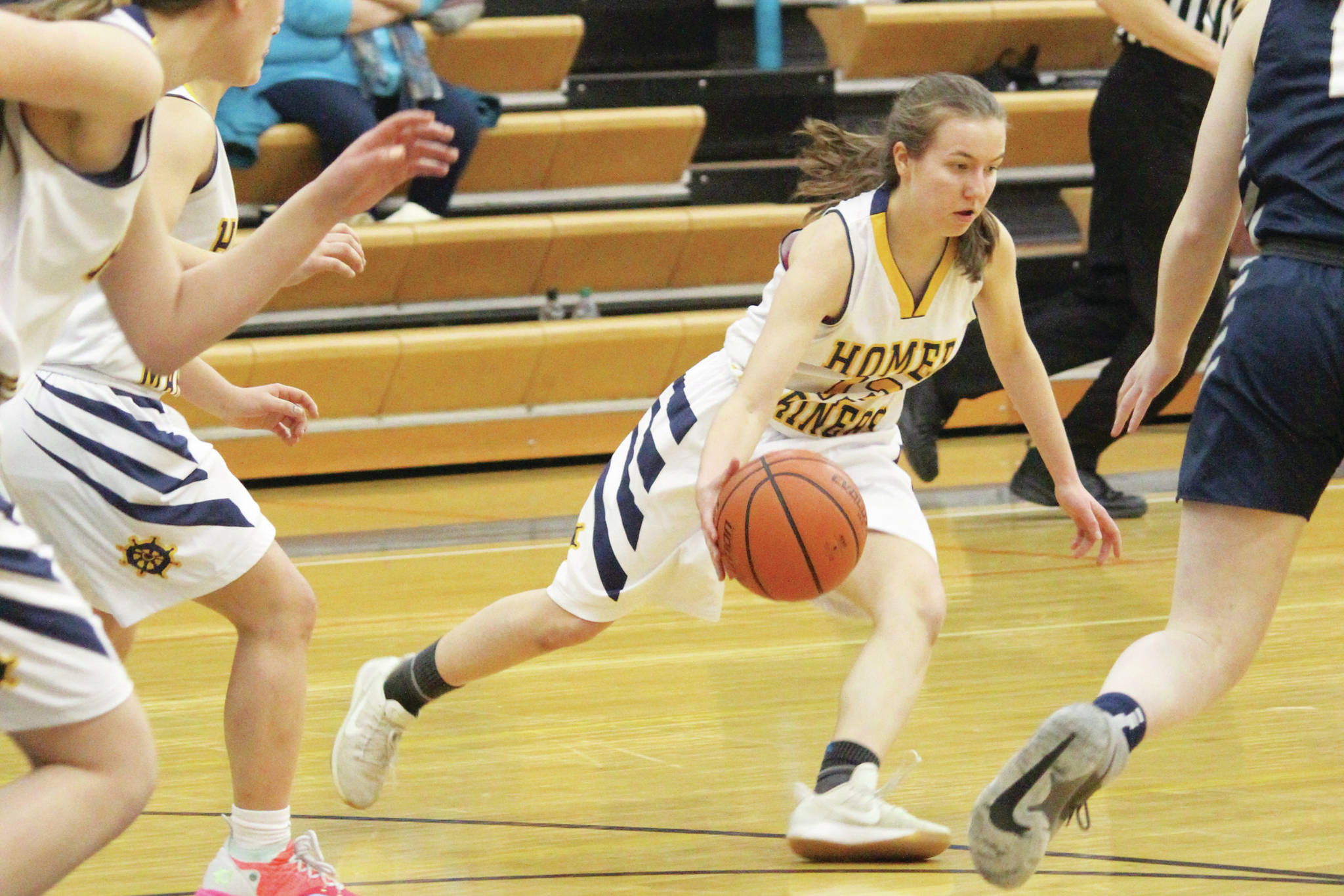 Homer’s Kappa Reutov gets a turnover during a Tuesday, Feb. 25, 2020 basketball game against Soldotna High School in the Alice Witte Gymnasium in Homer, Alaska. (Photo by Megan Pacer/Homer News)