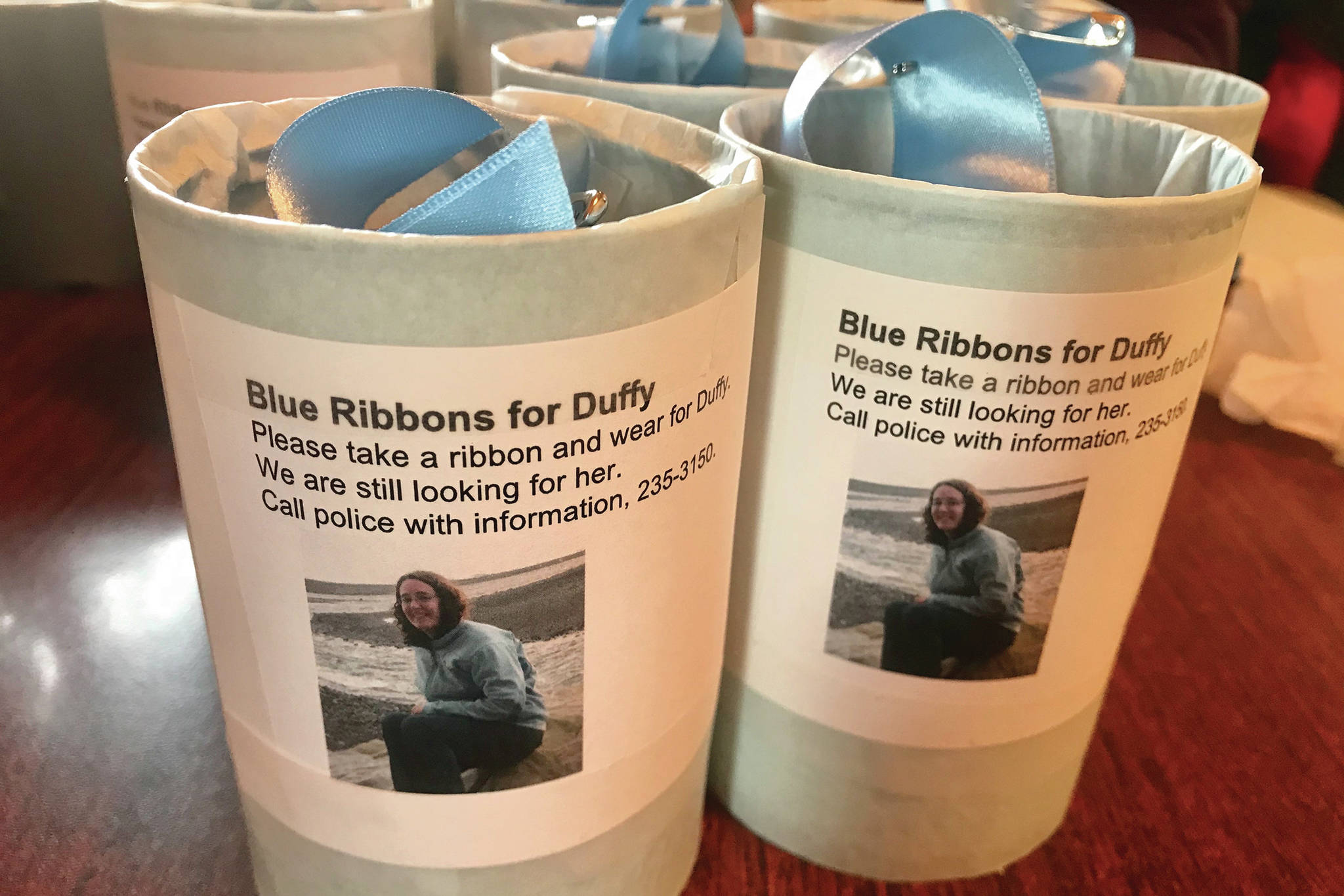 Tins with blue ribbons were placed on Feb. 26, 2020, around Homer, Alaska, for people to wear as part of an awareness campaign for a missing Homer woman, Anesha “Duffy” Murnane, missing since Oct. 17, 2019. (Photo courtesy of Christina Whiting)