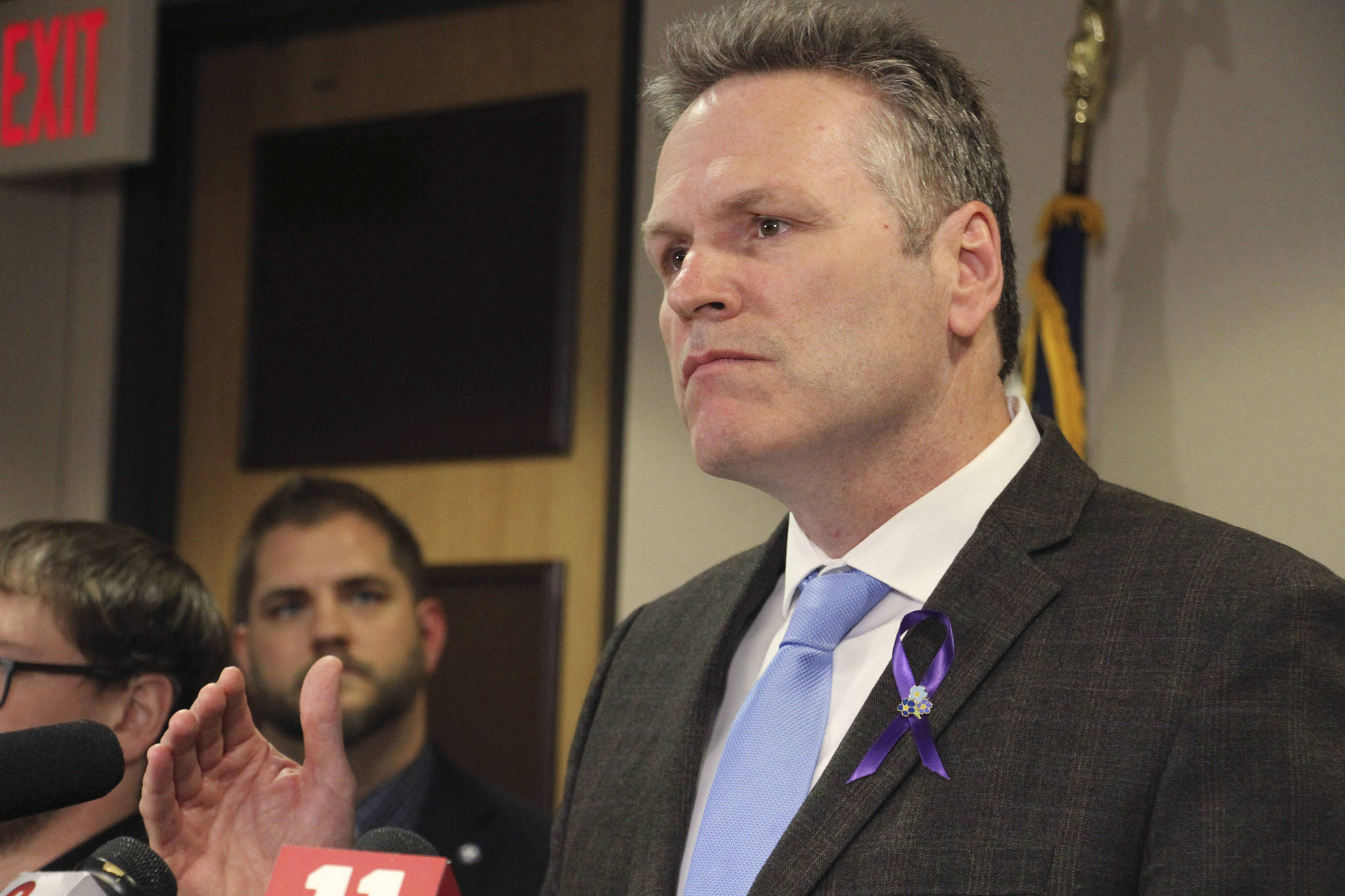 Alaska Gov. Mike Dunleavy announces the state of Alaska has its first positive case of the new coronavirus, during a news conference Thursday, March 12, 2020, in Anchorage, Alaska. (AP Photo/Mark Thiessen)