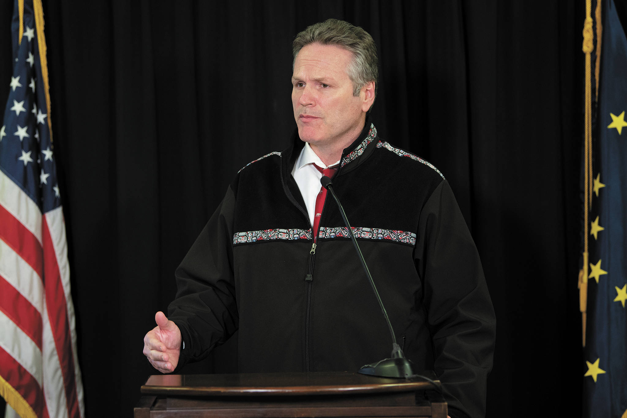 Gov. Mike Dunleavy speaks during a Friday, April 10, 2020 press conference in the Atwood Building in Anchorage, Alaska. (Photo courtesy Office of the Governor)