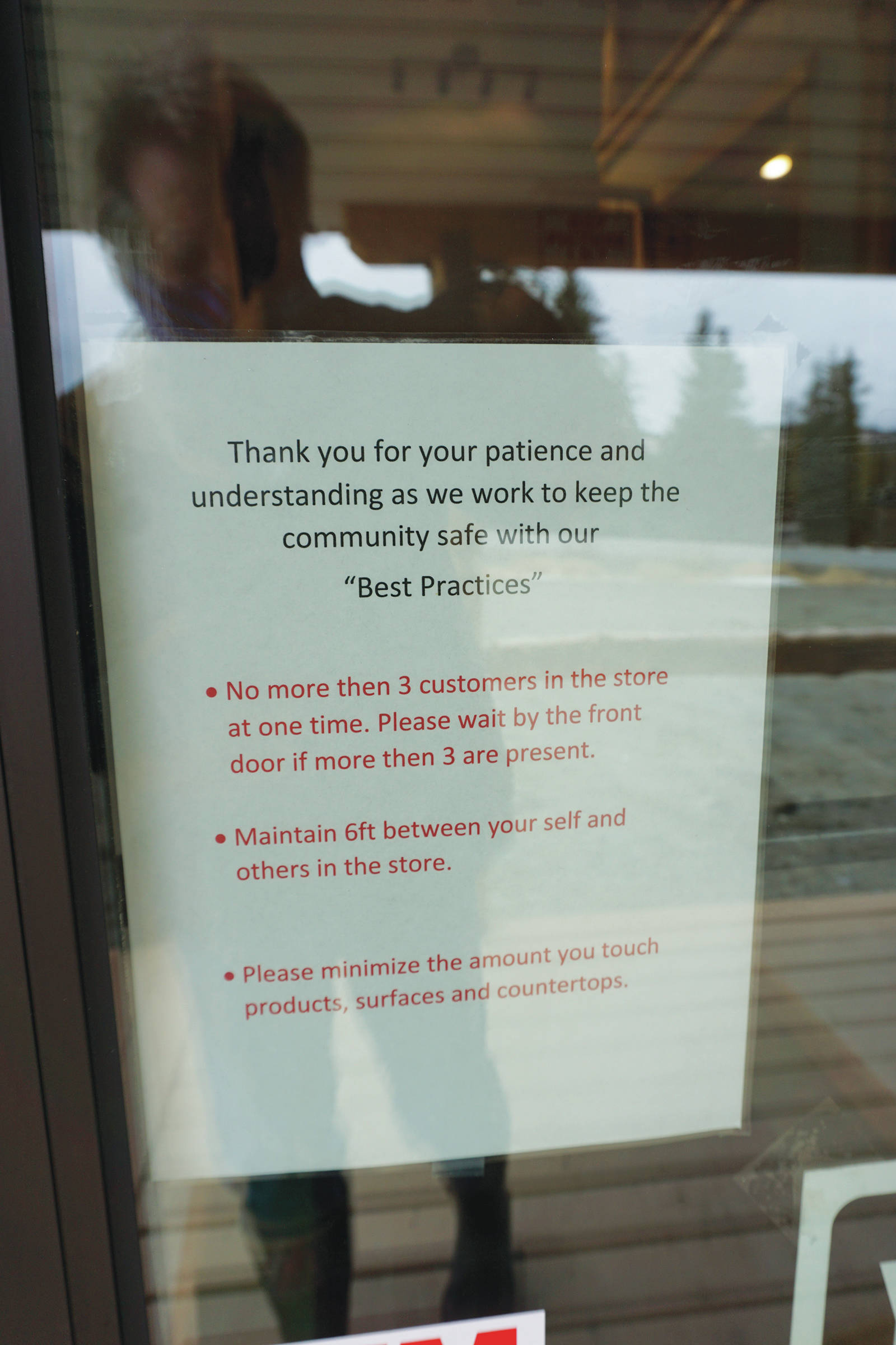 A sign on the door of Alaskan Cannabis Outfitters, a new cannabis retail store, advises social distancing and safe practices. Frontier CBD provided hand sanitizer for the store. The store is located right at Mile 168 Sterling Highway just before the road turns toward Baycrest Hill. The store opened on 4/20 — April 20, 2020 — in Homer, Alaska. (Photo by Michael Armstrong/Homer News)