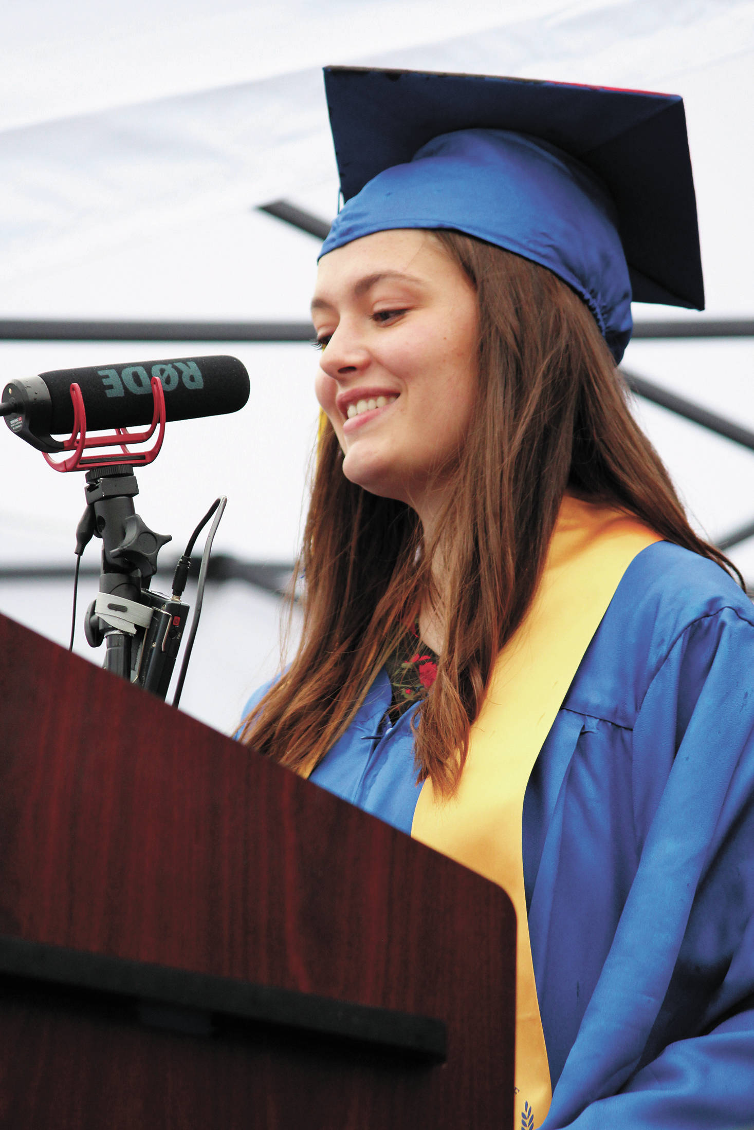Valedictorian Ruby Allen speaks to her fellow graduates Monday, May 18, 2020 during an alternative commencement ceremony held in front of Homer High School in Homer, Alaska. (Photo by Megan Pacer/Homer News)