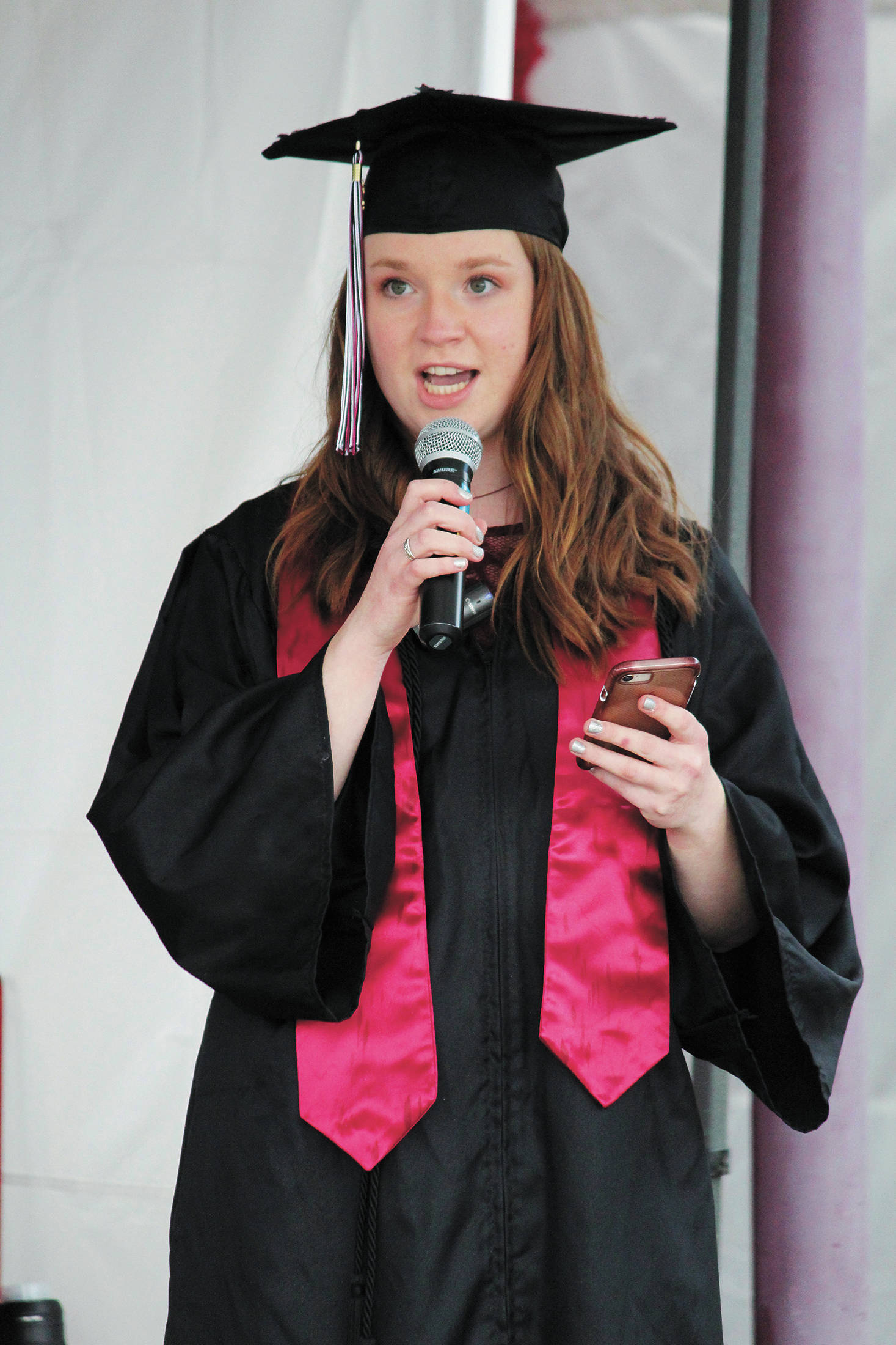 Nikolaevsk valedictorian Sophia Klaich addresses her fellow graduates during a Tuesday, May 19, 2020 commencement ceremony at the school in Nikolaevsk, Alaska. (Photo by Megan Pacer/Homer News)