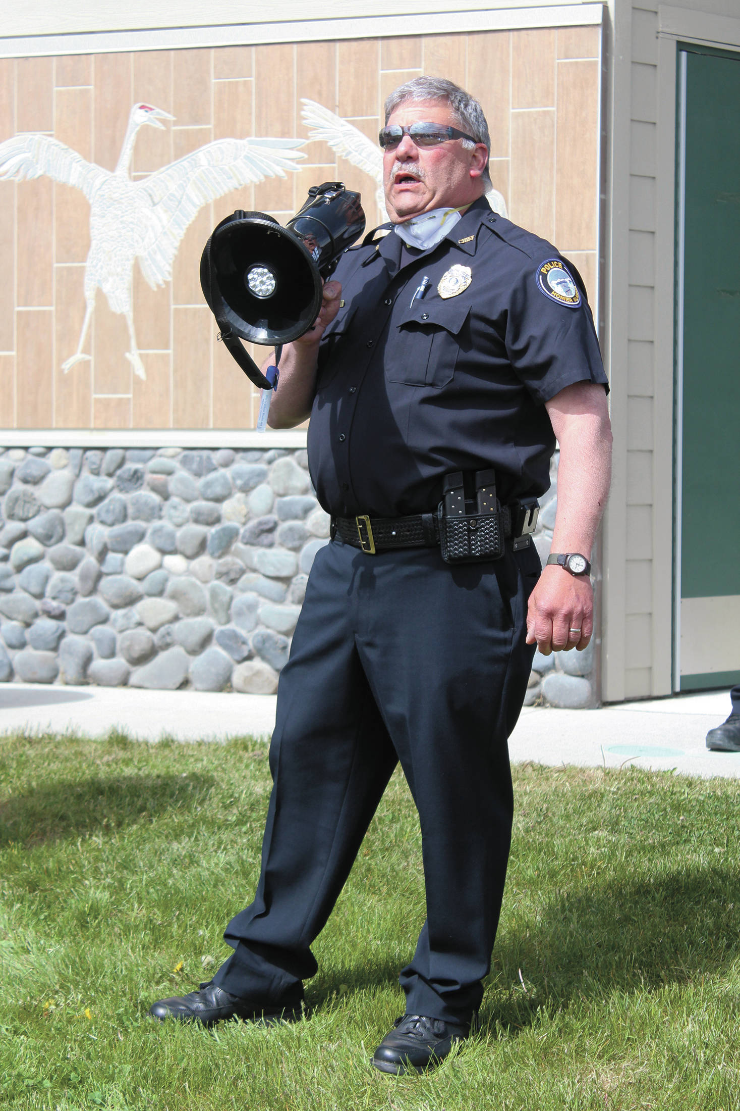 Homer Police Chief Mark Robl speaks to a small crowd of protesters on Thursday, June 4, 2020 in Wisdom, Knowledge, Faith and Love Park in Homer, Alaska. (Photo by Megan Pacer/Homer News)