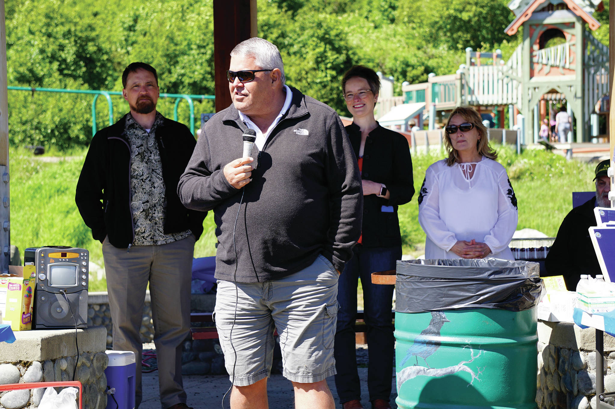 Kenai Peninsula Borough Mayor Charlie Pierce speaks at a campaign rally for Rep. Sarah Vance, R-Homer, on Sunday, June 14, 2020, at Karen Hornaday Park in Homer, Alaska. Listening at back are, from left to right, Rep. Ben Carpenter, R-Nikiski; Vance; and Rep. Colleen Sullivan-Leonard, R-Wasilla. (Photo by Michael Armstrong/Homer News)