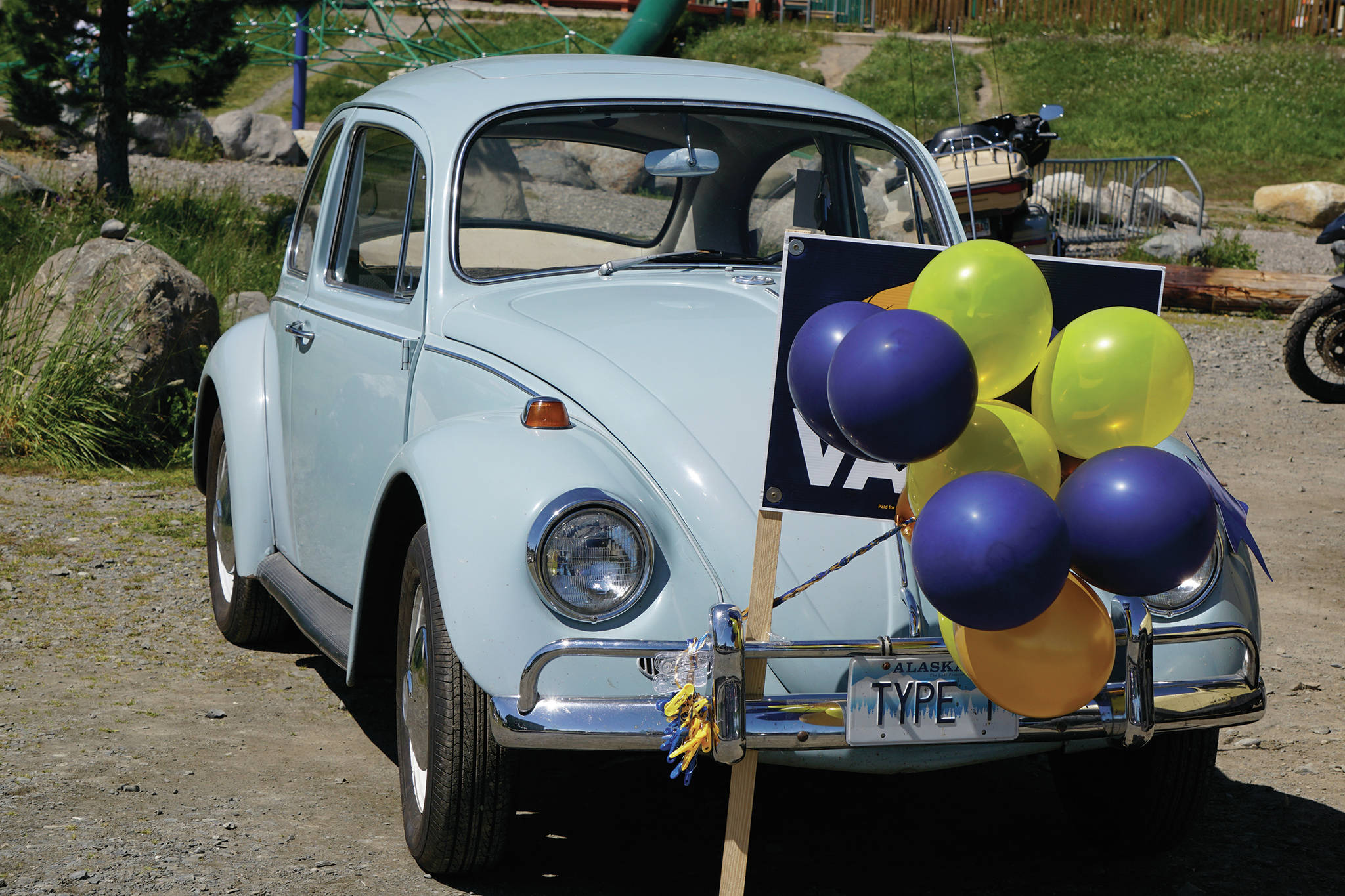 Eileen Becker’s 1967 Type 1 Volkswagen Beetle holds a “Vote Vance” yard sign at a campaign rally for Rep. Sarah Vance, R-Homer, on Sunday, June 14, 2020, at Karen Hornaday Park in Homer, Alaska. (Photo by Michael Armstrong/Homer News)