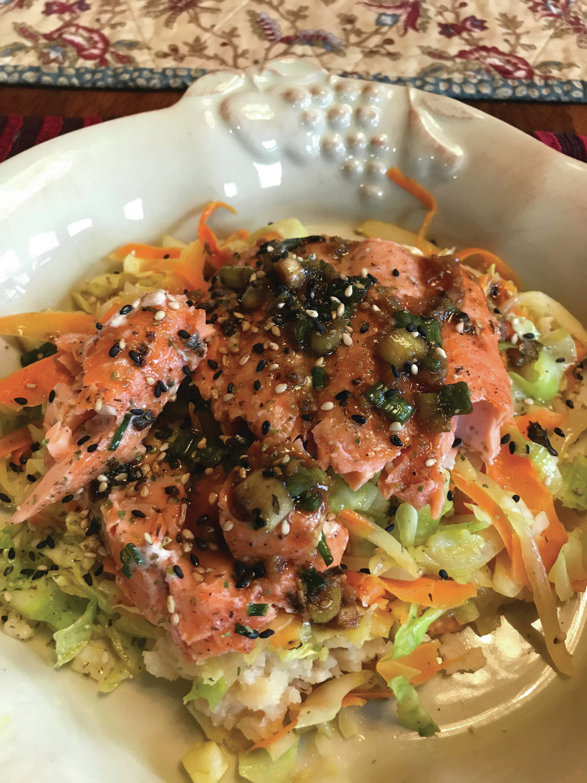 Roasted salmon with miso rice and ginger-scallion vinaigrette is seen here on Wednesday, June 24, 2020, in Teri Robl’s Homer, Alaska kitchen. (Photo by Teri Robl)
