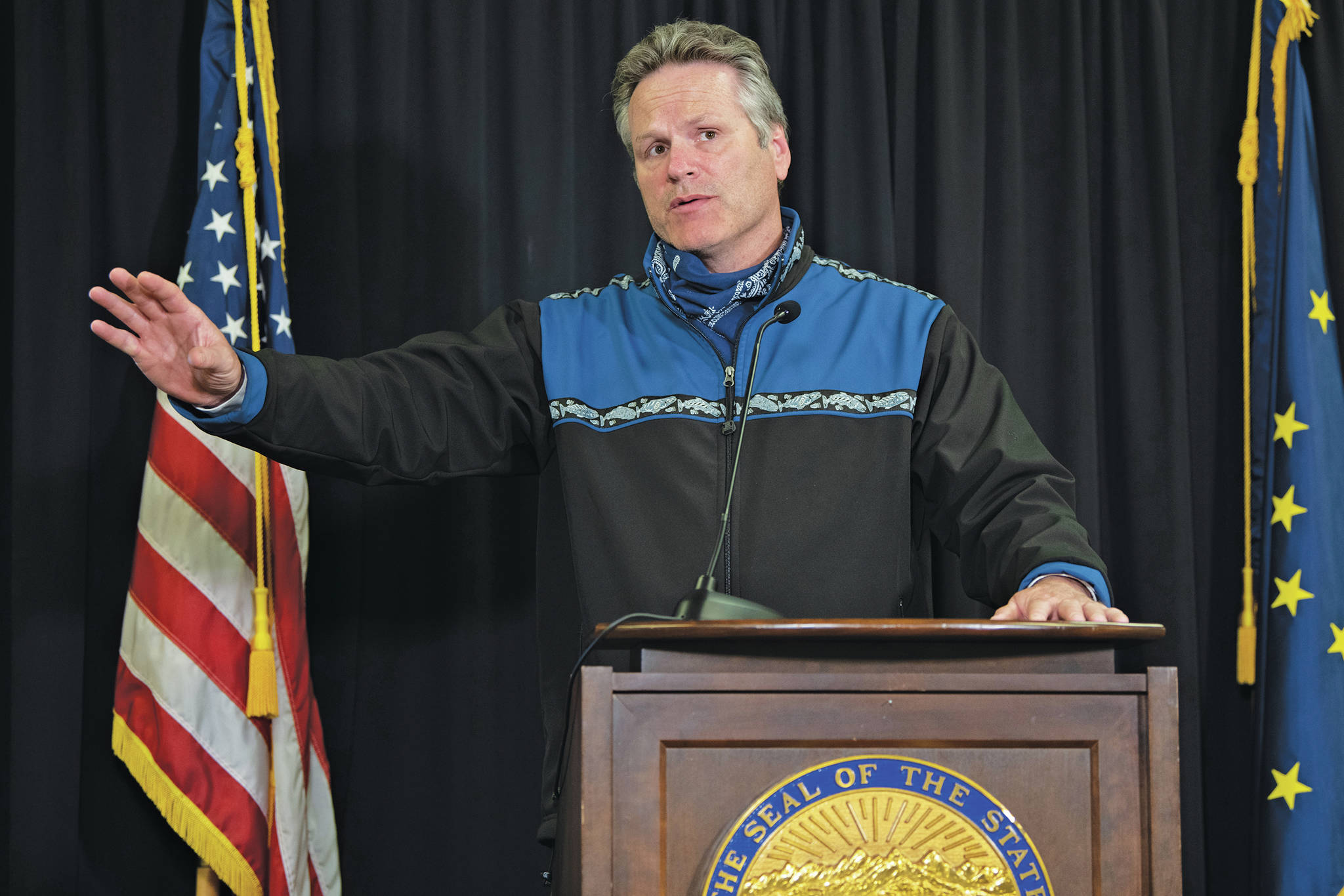 Gov. Mike Dunleavy speaks at a press conference on June 30 in Anchorage. (Photo by Austin McDaniel/Governor’s Office)