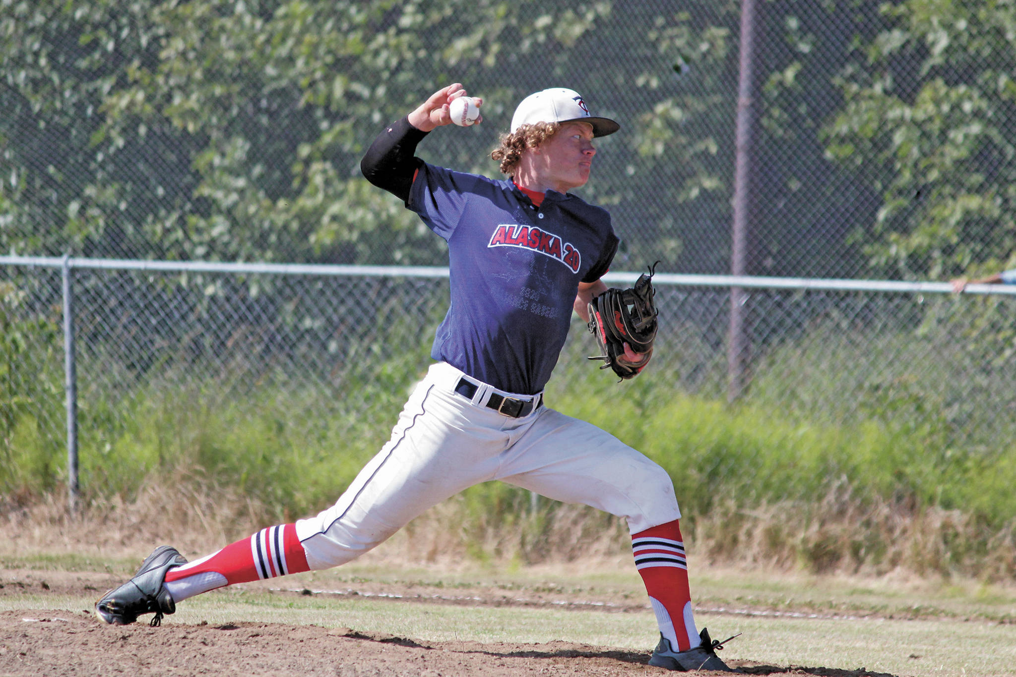 Alaska 20 player Mose Hayes pitches during an Alliance Baseball League game against Dimond on Saturday, July 4, 2020 at Karen Hornaday Park in Homer, Alaska. (Photo by Megan Pacer/Homer News)