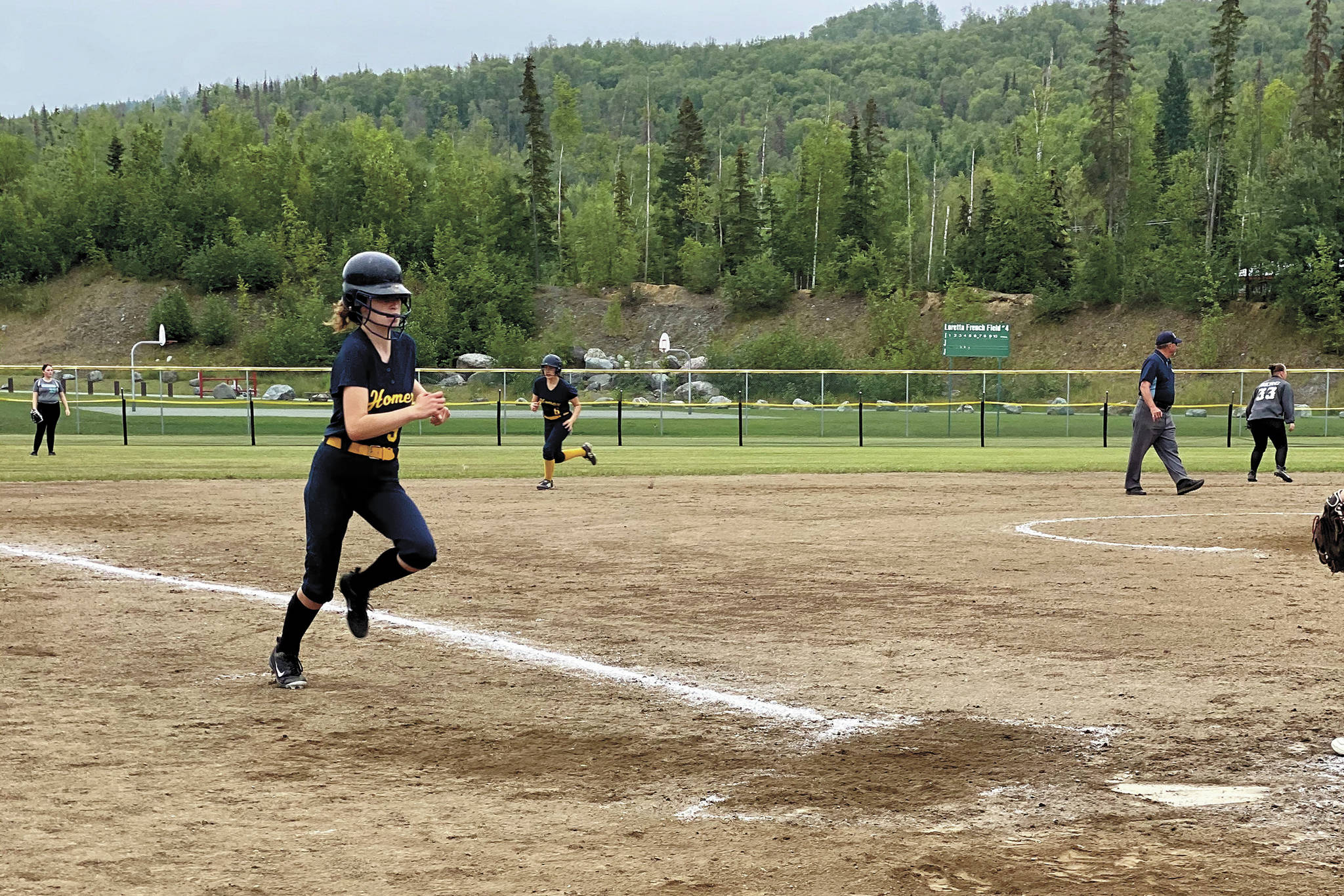 Kaylin Anderson makes a run during a state tournament for softball the weekend of Aug. 1-2, 2020 in Anchorage, Alaska. (Photo by Monica Anderson)