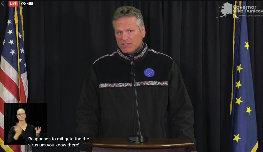 Gov. Mike Dunleavy speaks at a press conference on Aug. 18, 2020, held in Anchorage, Alaska while a sign-language interpreter, lower left, signs. (Livestream screenshot courtesy Office of the Governor)