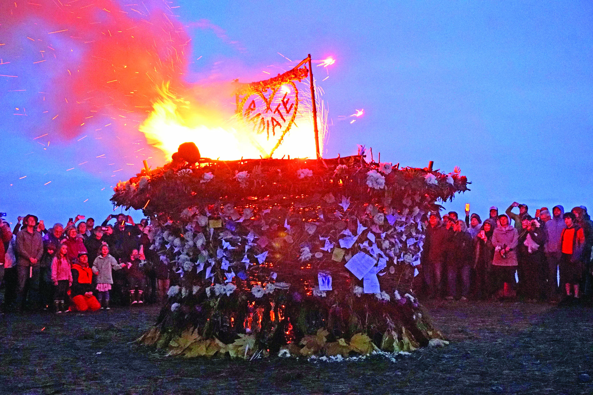 "Radiate," the 16th annual Burning Basket, catches fire Sunday night, Sept. 15, 2019, at Mariner Park on the Homer Spit in Homer, Alaska. (Photo by Michael Armstrong/Homer News)