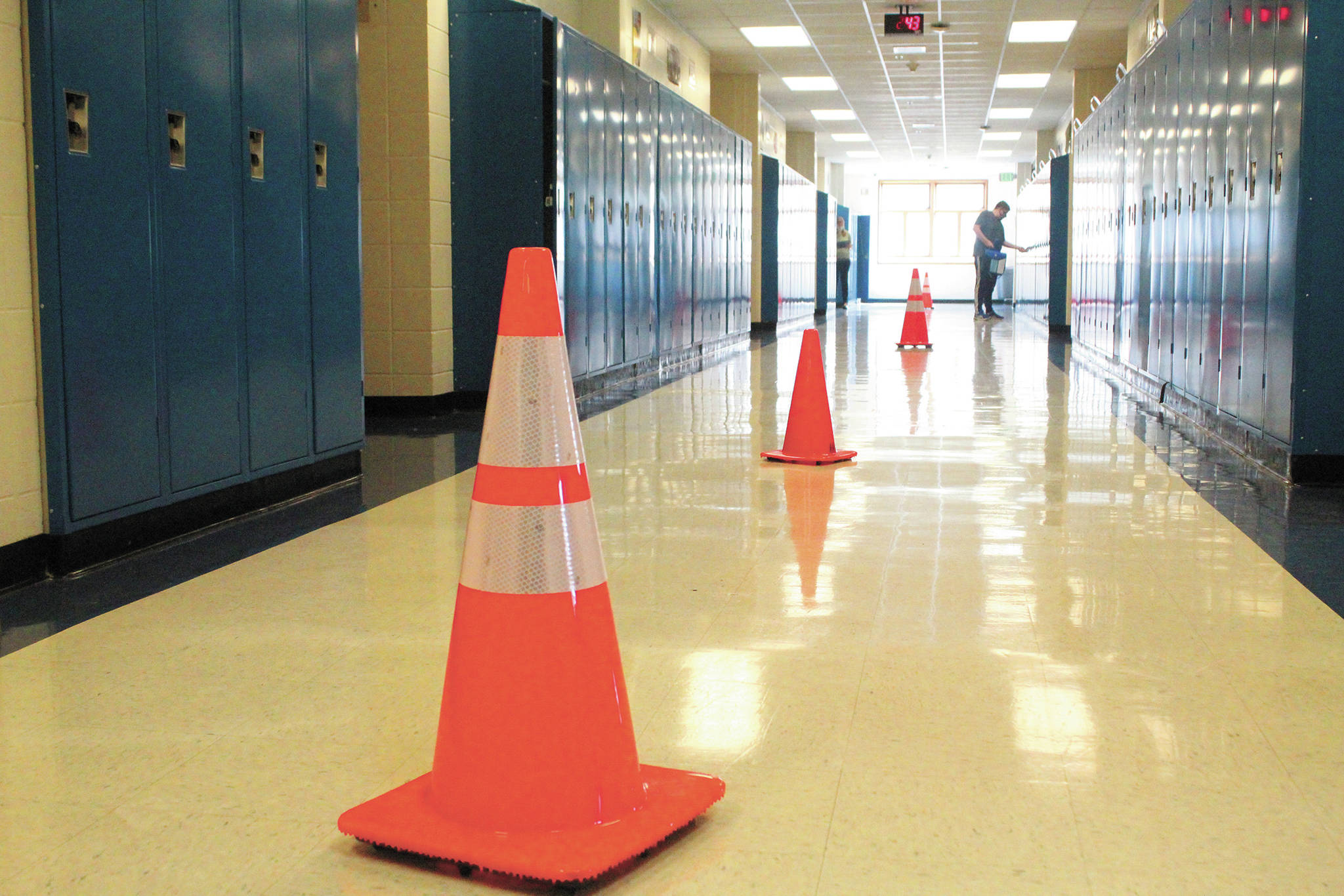 Orange cones mark the desired one-way traffic pattern down the hallways of Homer High School on Monday, Aug. 24, 2020 in Homer, Alaska. (Photo by Megan Pacer/Homer News)