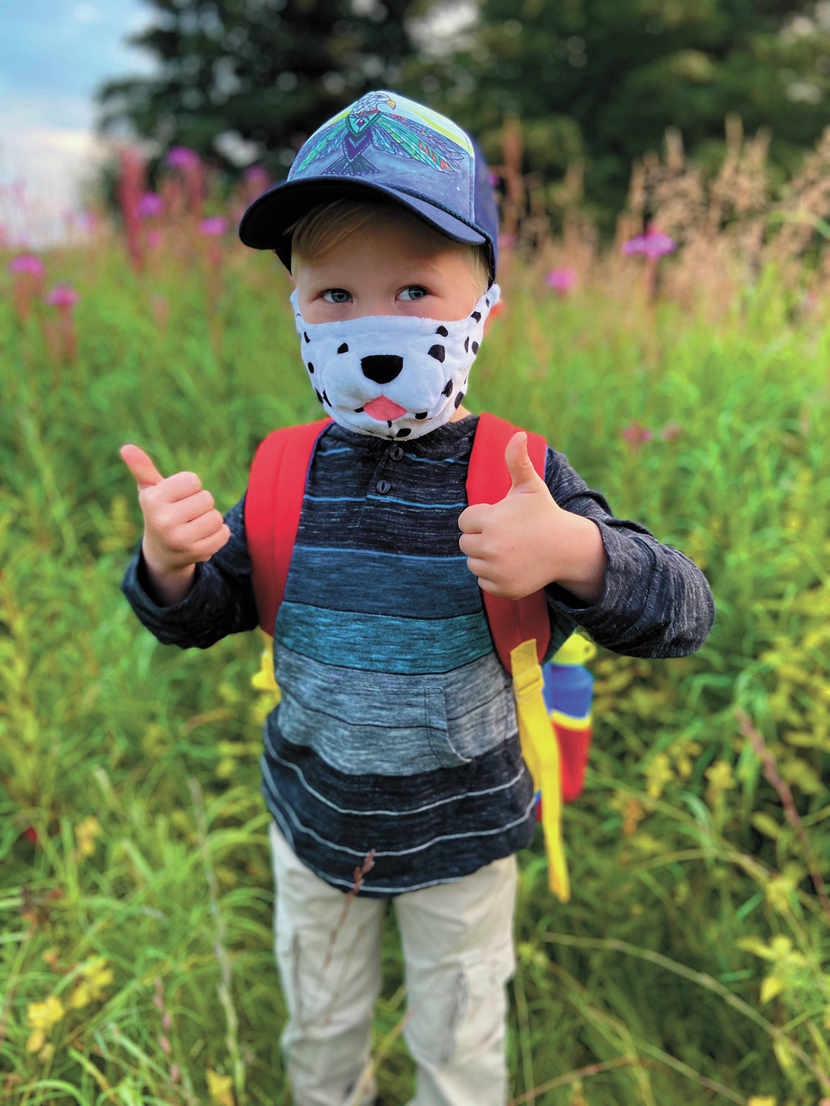 Austin Lake, a Kindergartener, shows off his mask for the first day of school at Little Fireweed Academy on Monday, Aug. 24, 2020 in Homer, Alaska. (Photo courtesy Janet Bowen, Fireweed Academy)