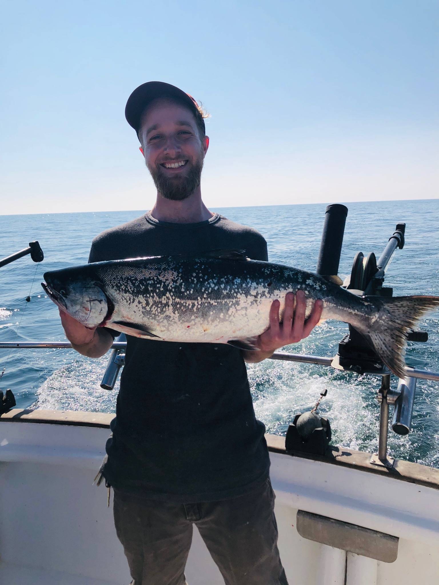 The author holds a king salmon caught on Aug. 16, 2020 in Kachemak Bay near Homer, Alaska. (Photo courtesy Lizzie Byrne)